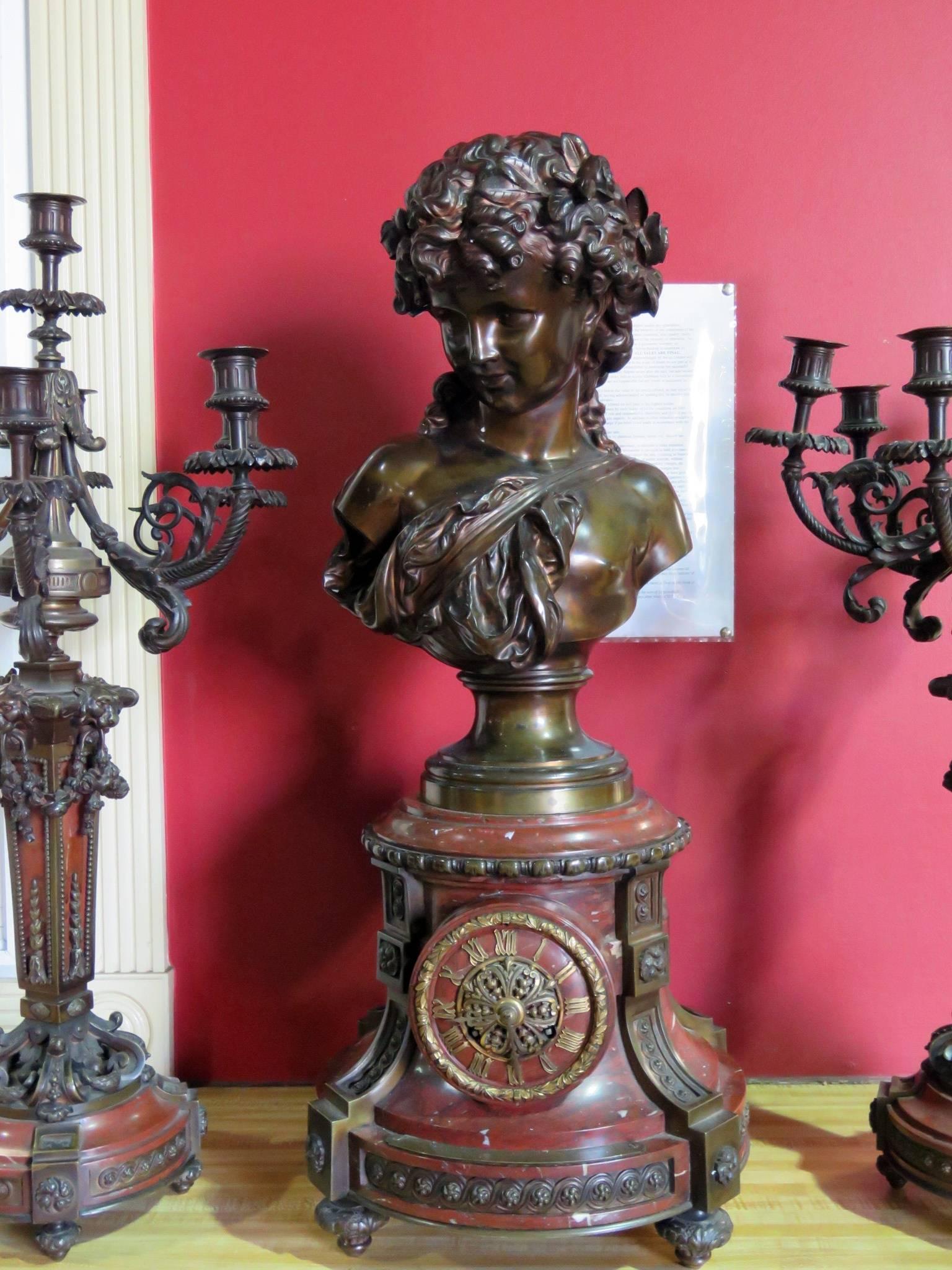 Palatial three-piece clock set with bronze and marble clock set by Canivet. Clock measures: 22