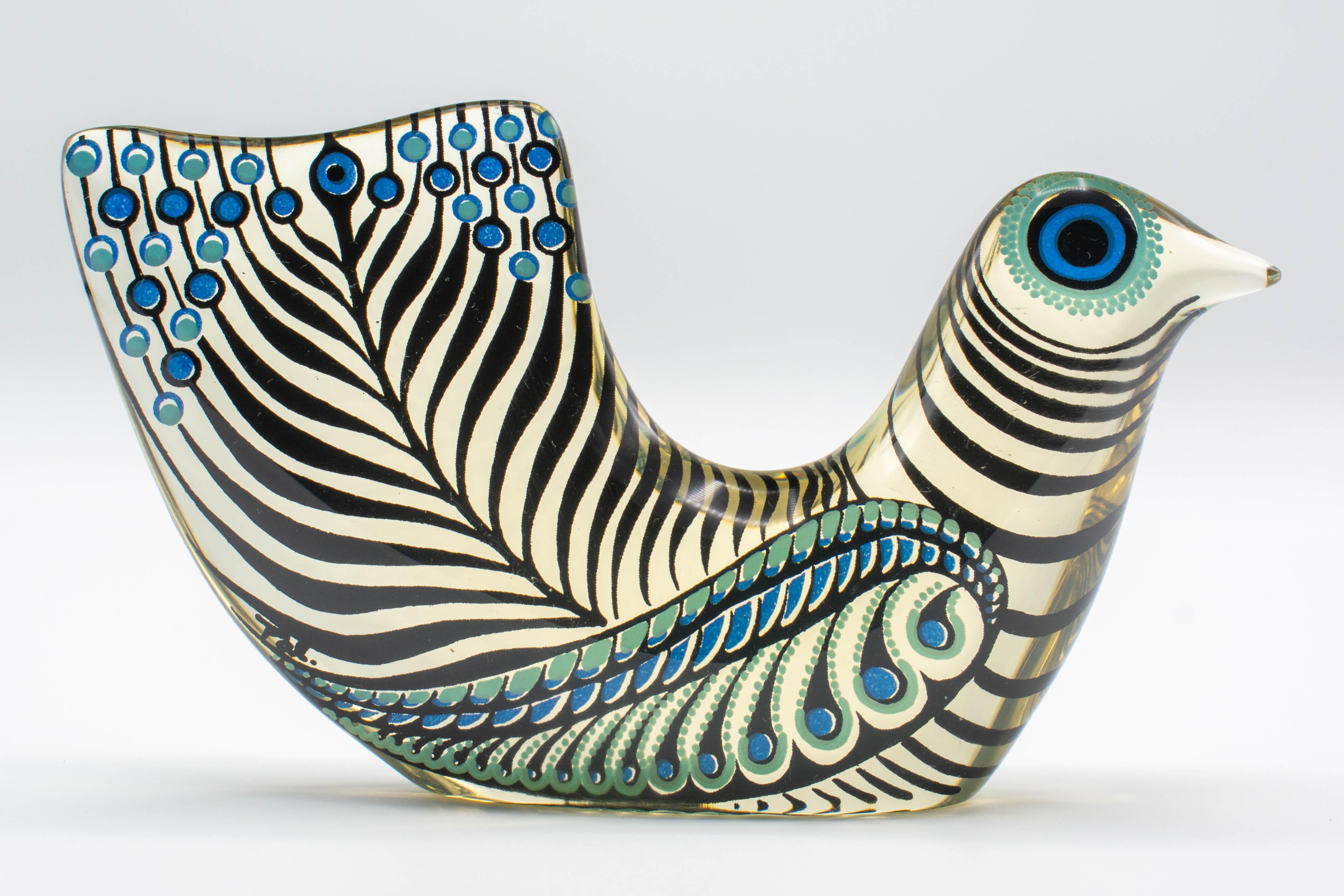 A Mid-Century Modern Lucite Op Art blue, turquoise and black bird designed by Abraham Palatnik. Abraham Palatnik (born in 1928) is a Brazilian artist and inventor whose innovations include kinechromatic art. Part of the Artemis Collection that