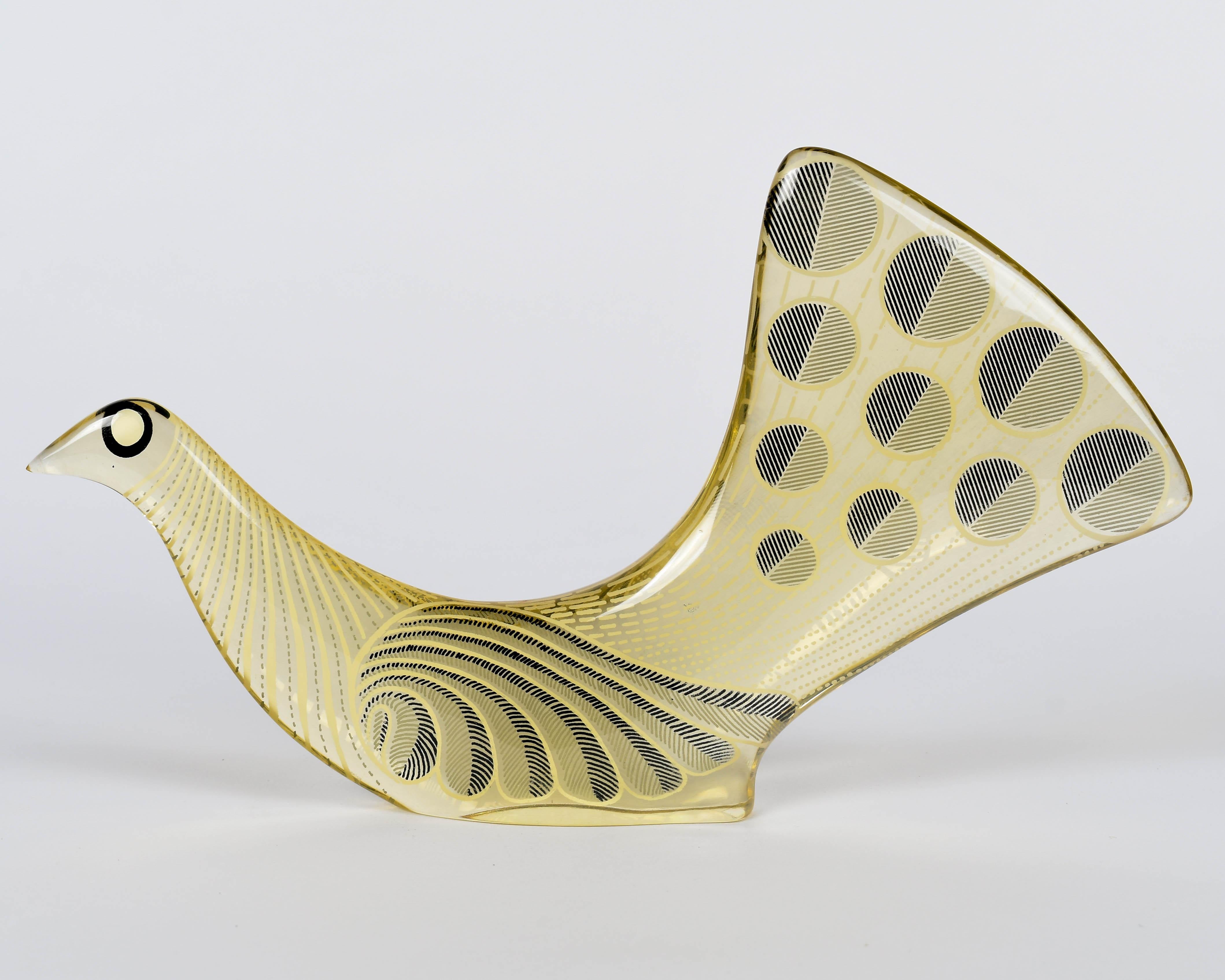 A Mid-Century Modern Lucite Op Art bird in pale yellow, white and black designed by Abraham Palatnik. Abraham Palatnik (born in 1928) is a Brazilian artist and inventor whose innovations include kinechromatic art. Part of the Artemis Collection that