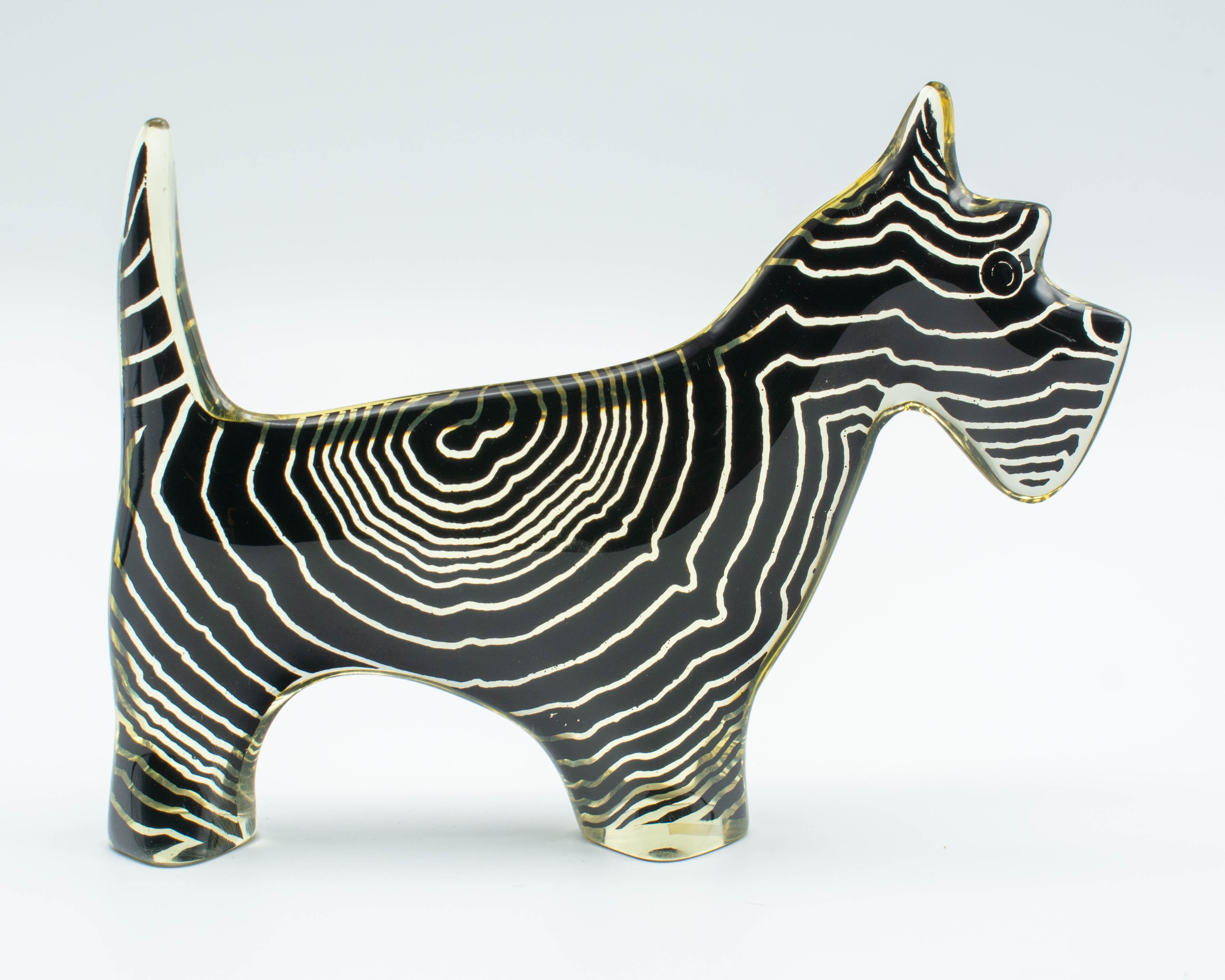 A Modern Lucite Op Art Scottie dog, designed by Abraham Palatnik. Original label on bottom: Made in Brazil. Circa 1970s
Abraham Palatnik (1928-2020) is a Brazilian artist and inventor whose innovations include kinechromatic art. Part of the Artemis