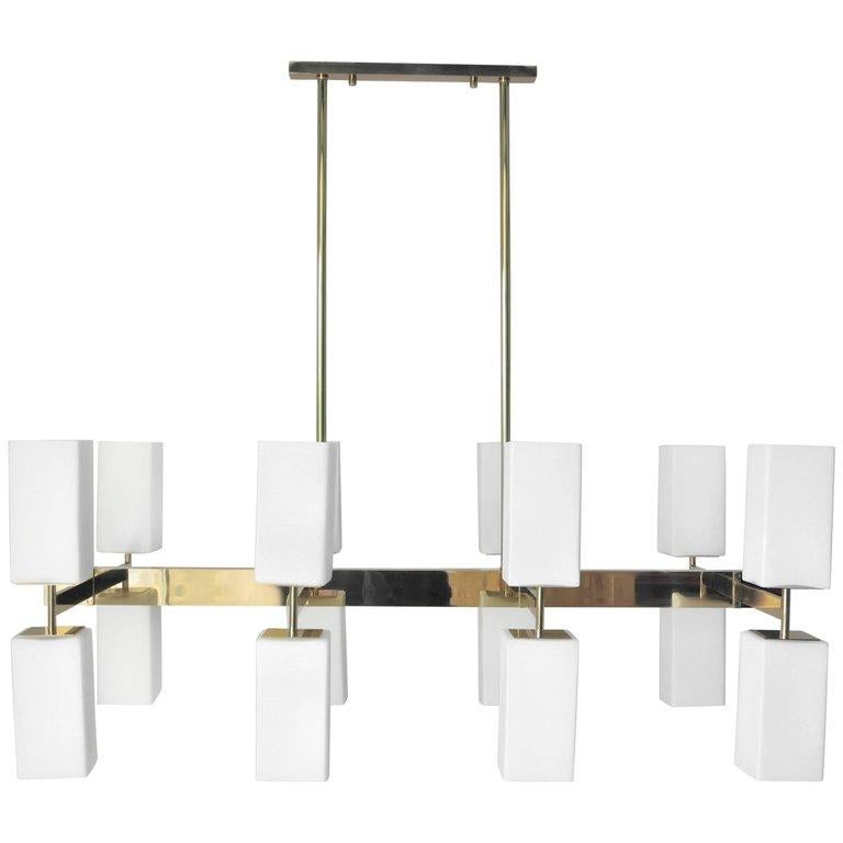 Italian modern chandelier with frosted white rectangular Murano glass shades, mounted on polished brass frames / Designed by Fabio Bergomi for Fabio Ltd / Made in Italy
16 lights / E26 or E27 type / max 60W each 
Width: 47 inches / Depth: 25.5
