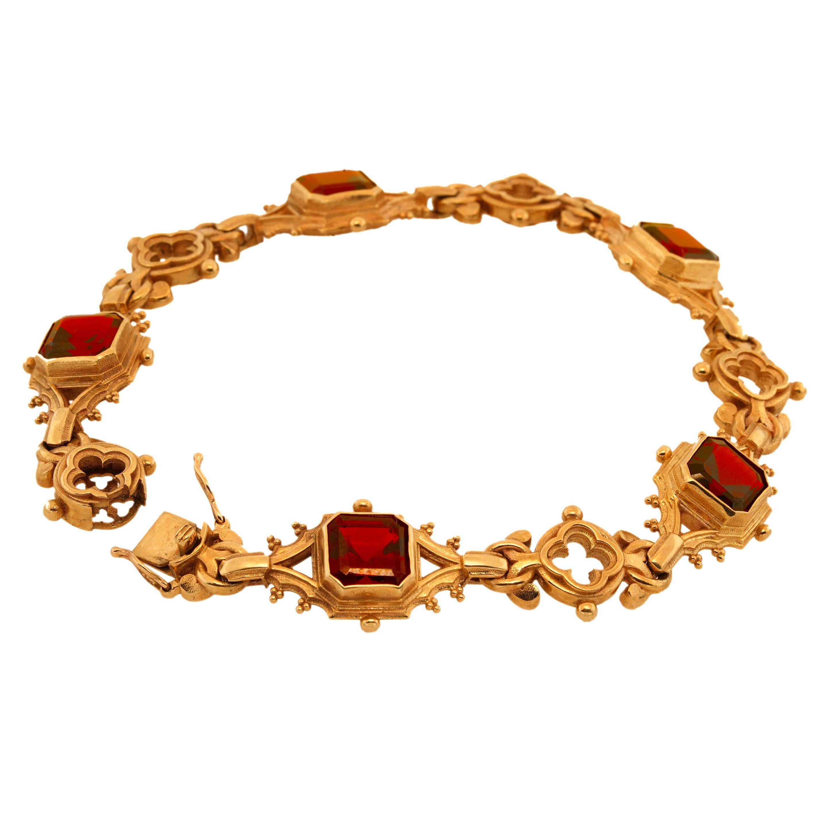 PALAZZO DUCALE GOTHIC GARNET LINK BRACELET

Masterfully handcrafted in 9kt yellow gold this exquisite gothic inspired link bracelet is a feast for the eyes. It features five mesmerizing deep scarlet 8mm x 8mm Asscher cut garnets housed in the most