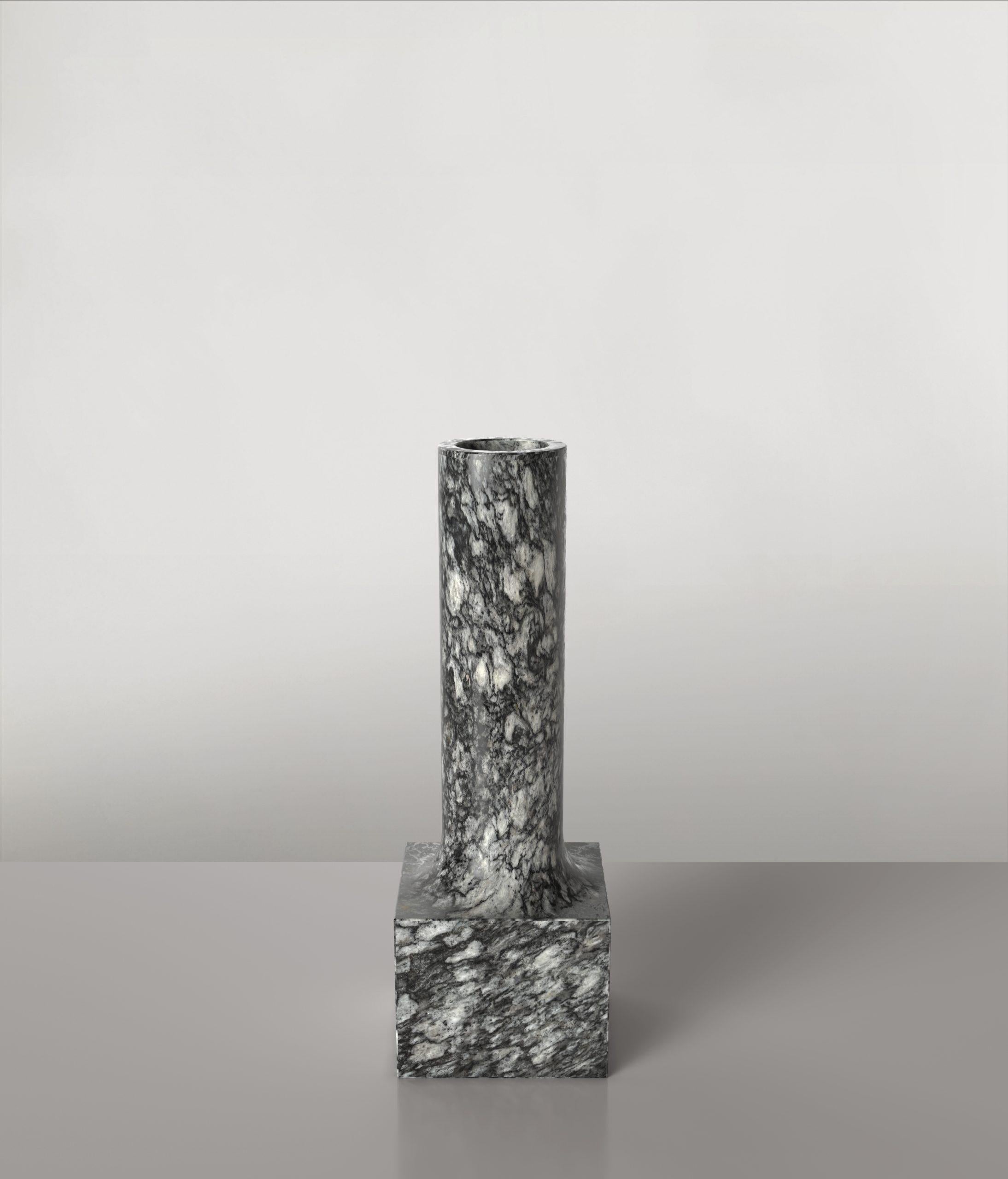 Palazzo V2 vase by Edizione Limitata
Limited Edition of 150 pieces. Signed and numbered.
Dimensions: D 12 x W 12 x H 35 cm.
Materials: Granite.

Edizione Limitata, that is to say “Limited Edition”, is a brand promoting and developing objects