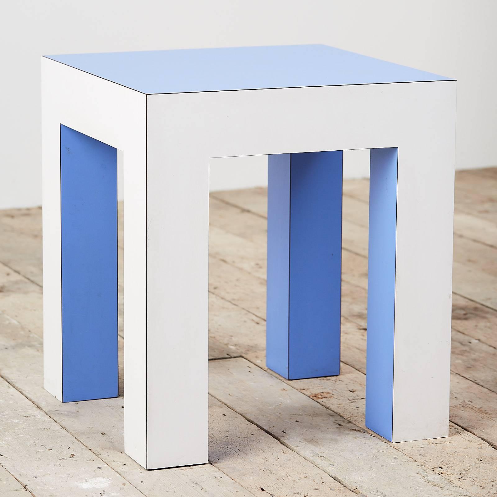 A pale blue and white side table with Formica and wood construction, Italian, 1980s.