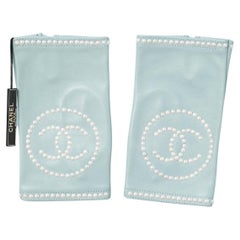 Pale blue leather mittens with mother-of-shell studs decoration Chanel 
