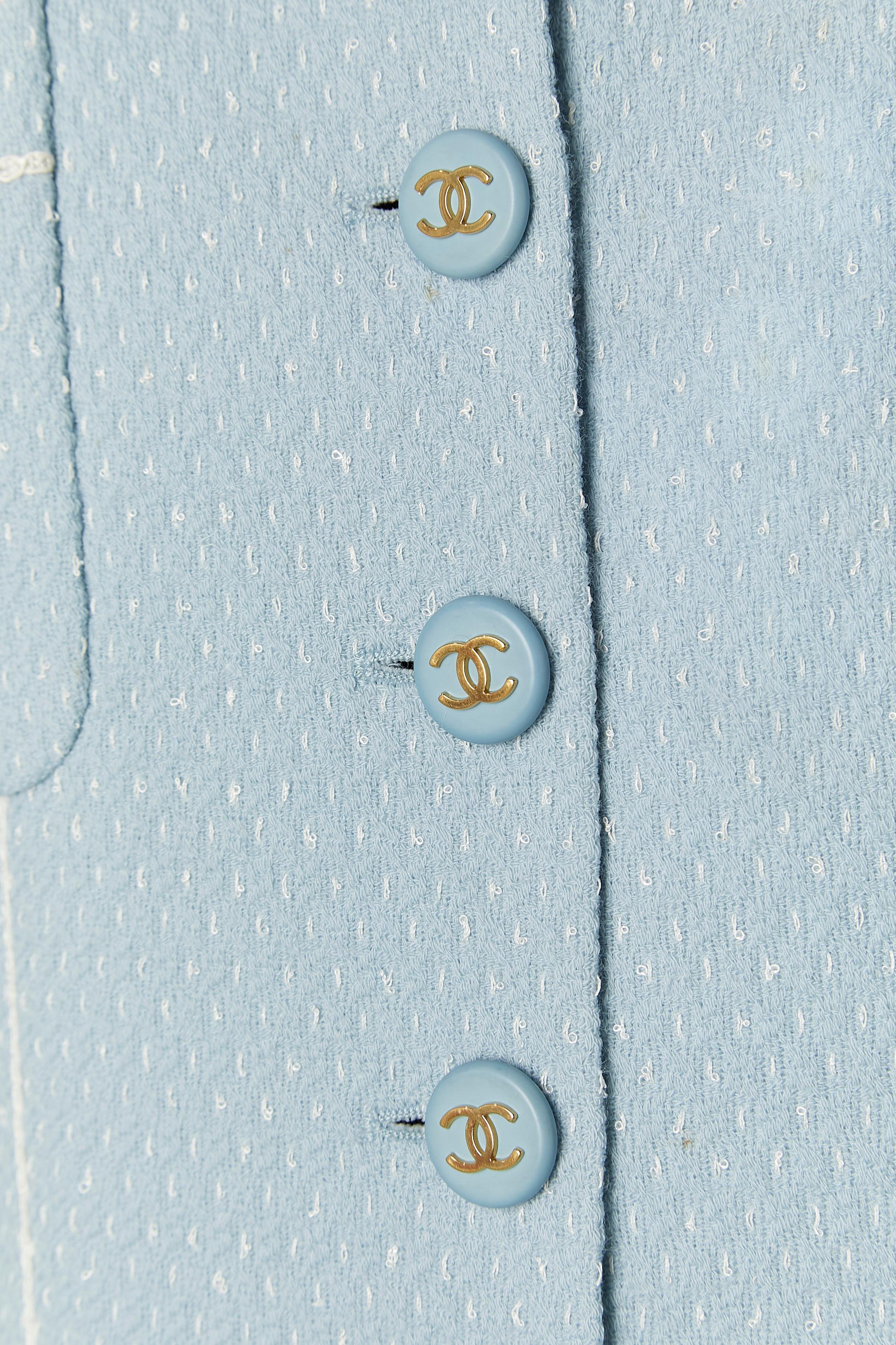 Veste longue en tweed bleu pâle à simple boutonnage CHANEL Boutique fo Bergdorf Goodman Pour femmes en vente