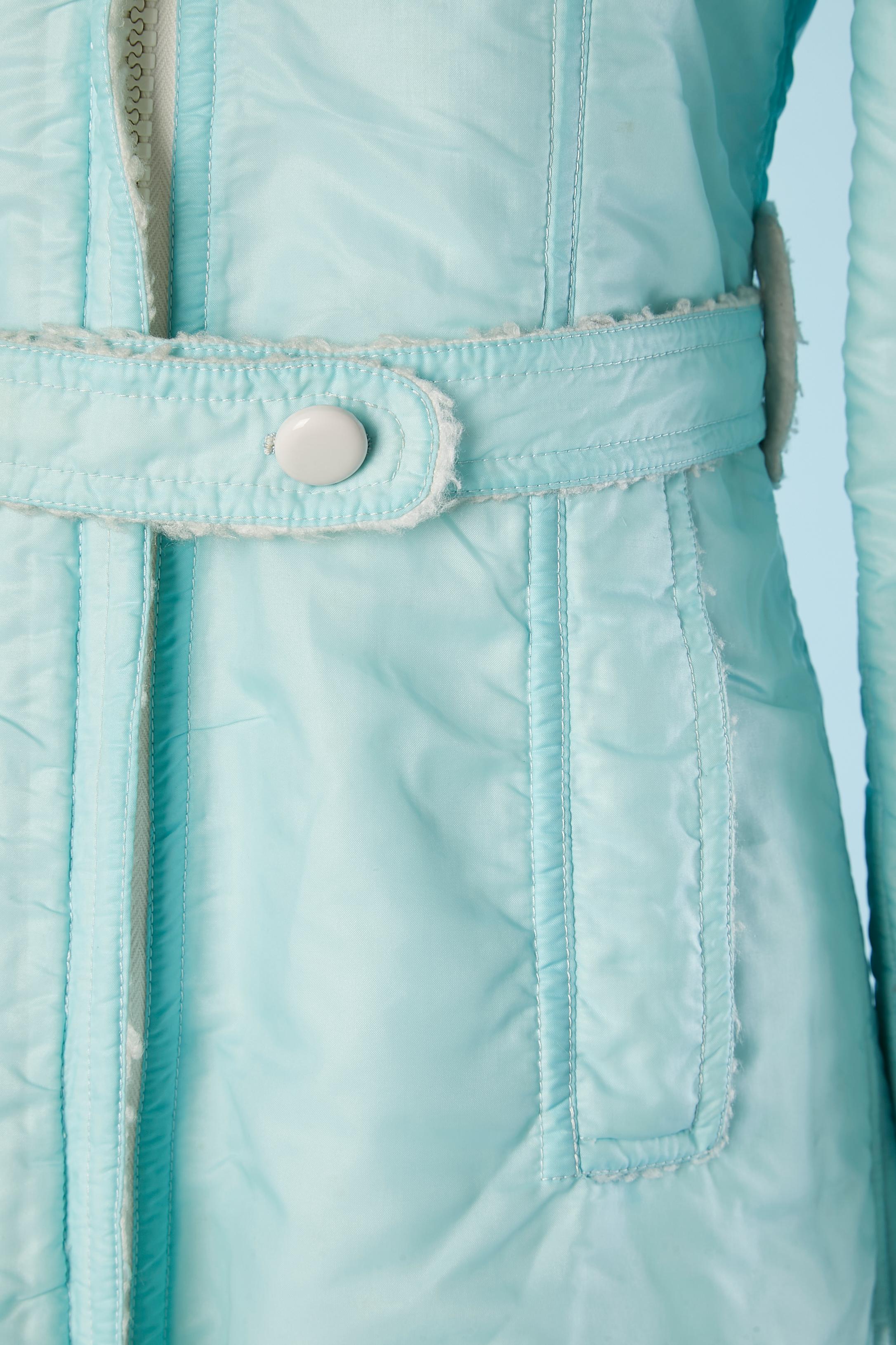 Blue Pale blue nylon coat with hood and fake fur Courrèges Hyperbole Circa 1971/72 For Sale