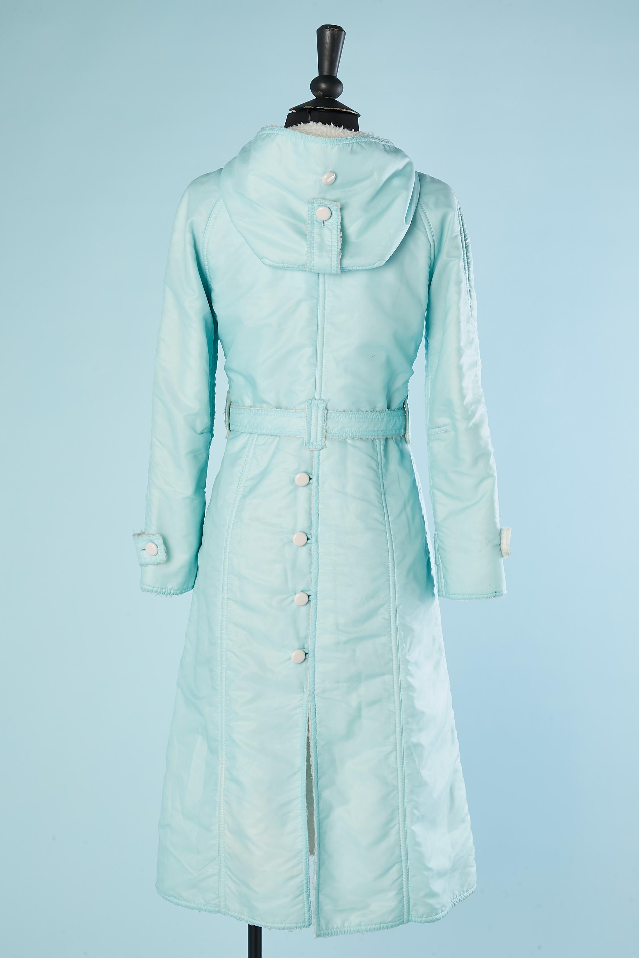 Pale blue nylon coat with hood and fake fur Courrèges Hyperbole Circa 1971/72 For Sale 1