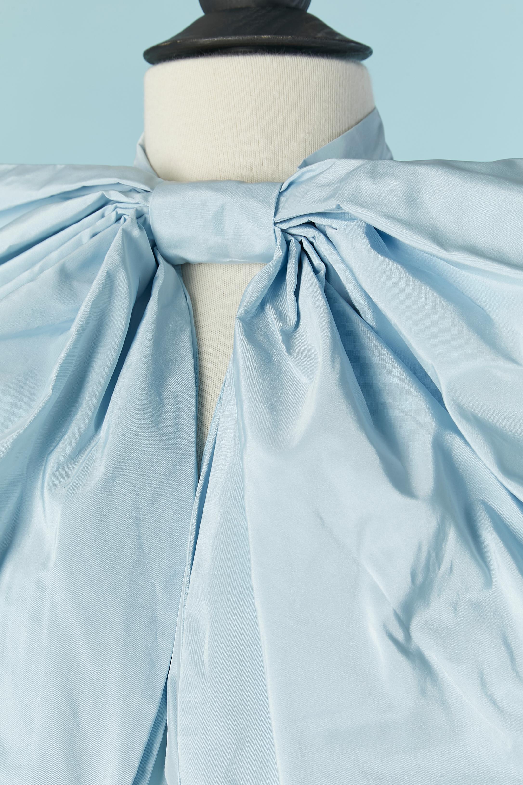 Pale blue nylon sleeveless top with oversize bow. Fabric composition: 100% nylon. Hook&eye closure on the top middle back. SAMPLE 
size M 