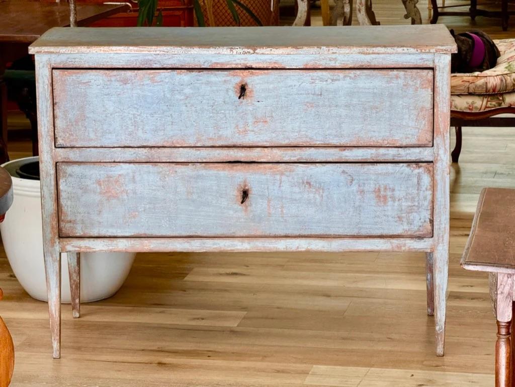 Lovely blue-painted 19th Century Italian Chest of drawers. Having the clean lines of Neoclassical form and similar to its Swedish cousins.  Reconditioned, paint refreshed.  Having two drawers over square tapered feet.

