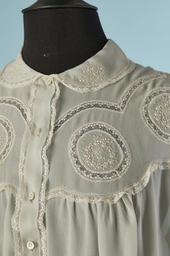 Pale blue silk chiffon nightgown with handmade embroideries and lace Circa 1930