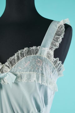 Pale blue slip dress with tulle lace edge and thread embroideries Circa 1950's
