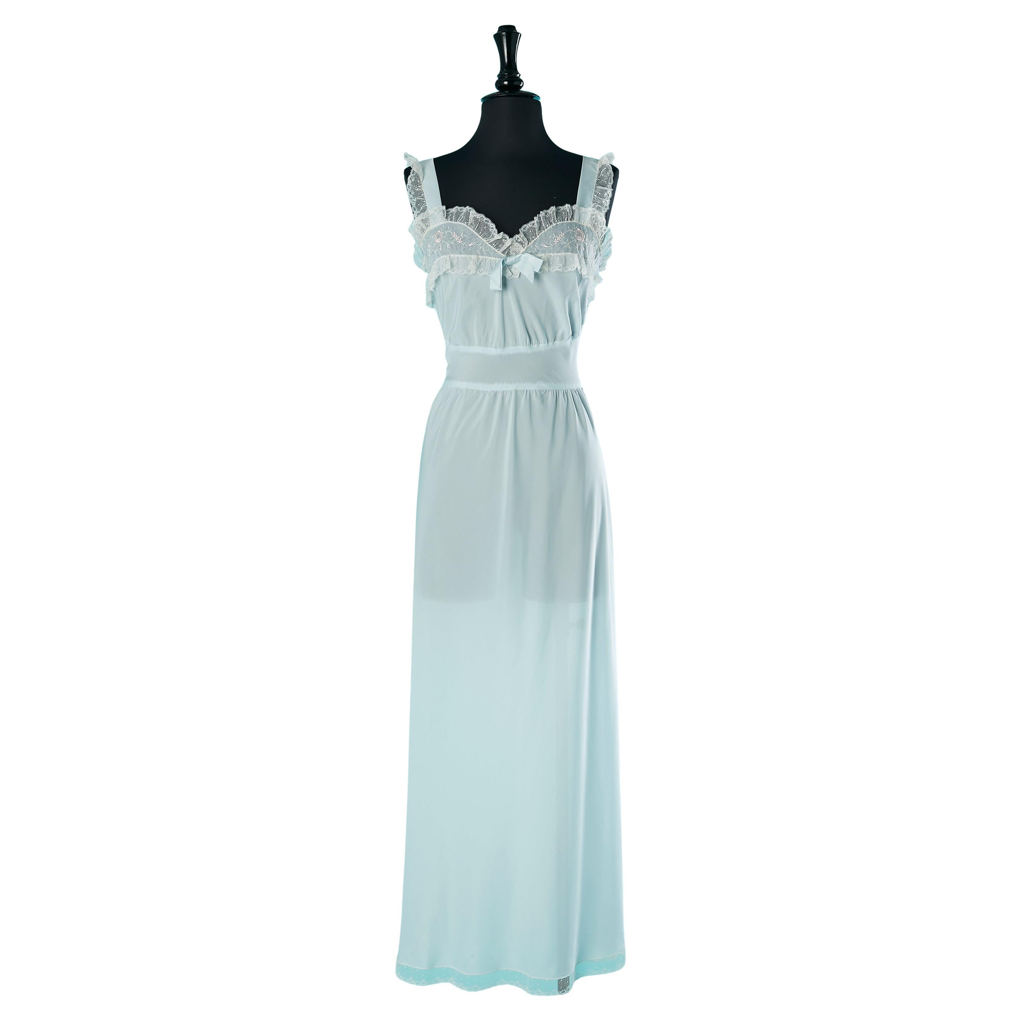 Pale blue slip dress with tulle lace edge and thread embroideries Circa 1950
s