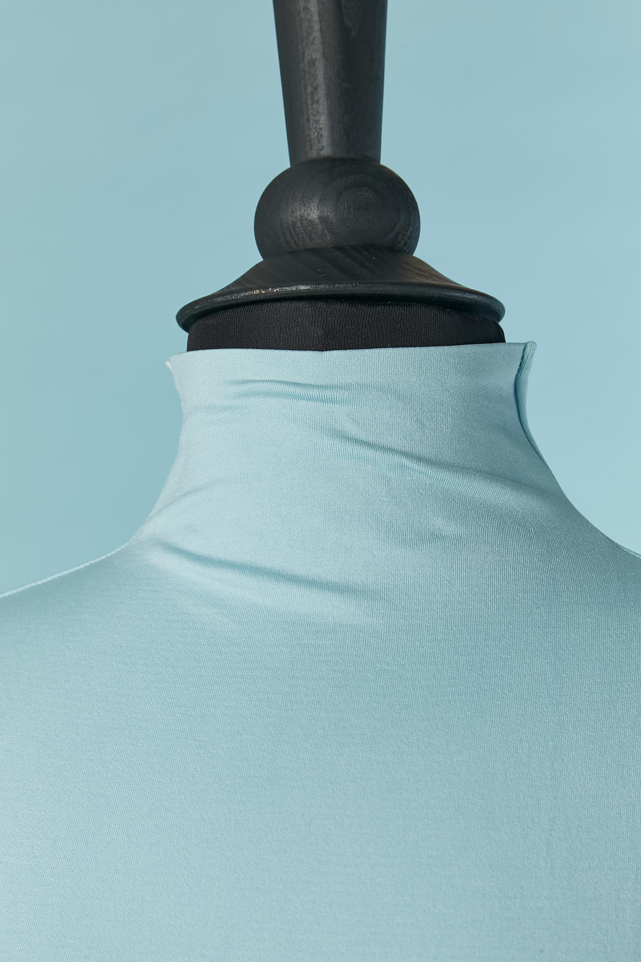 Pale blue stretch dress with backless. Fabric composition: 92% nylon 8% spandex 
Split on the left, lenght= 60cm
SIZE XS
