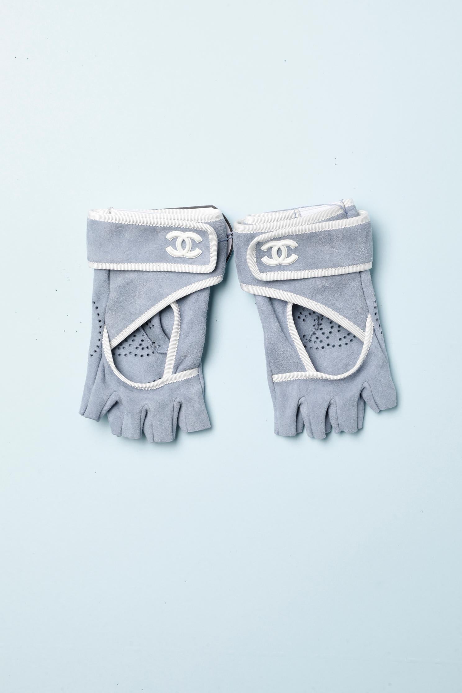 Pale blue suede mittens with white gros-grain piping and white 