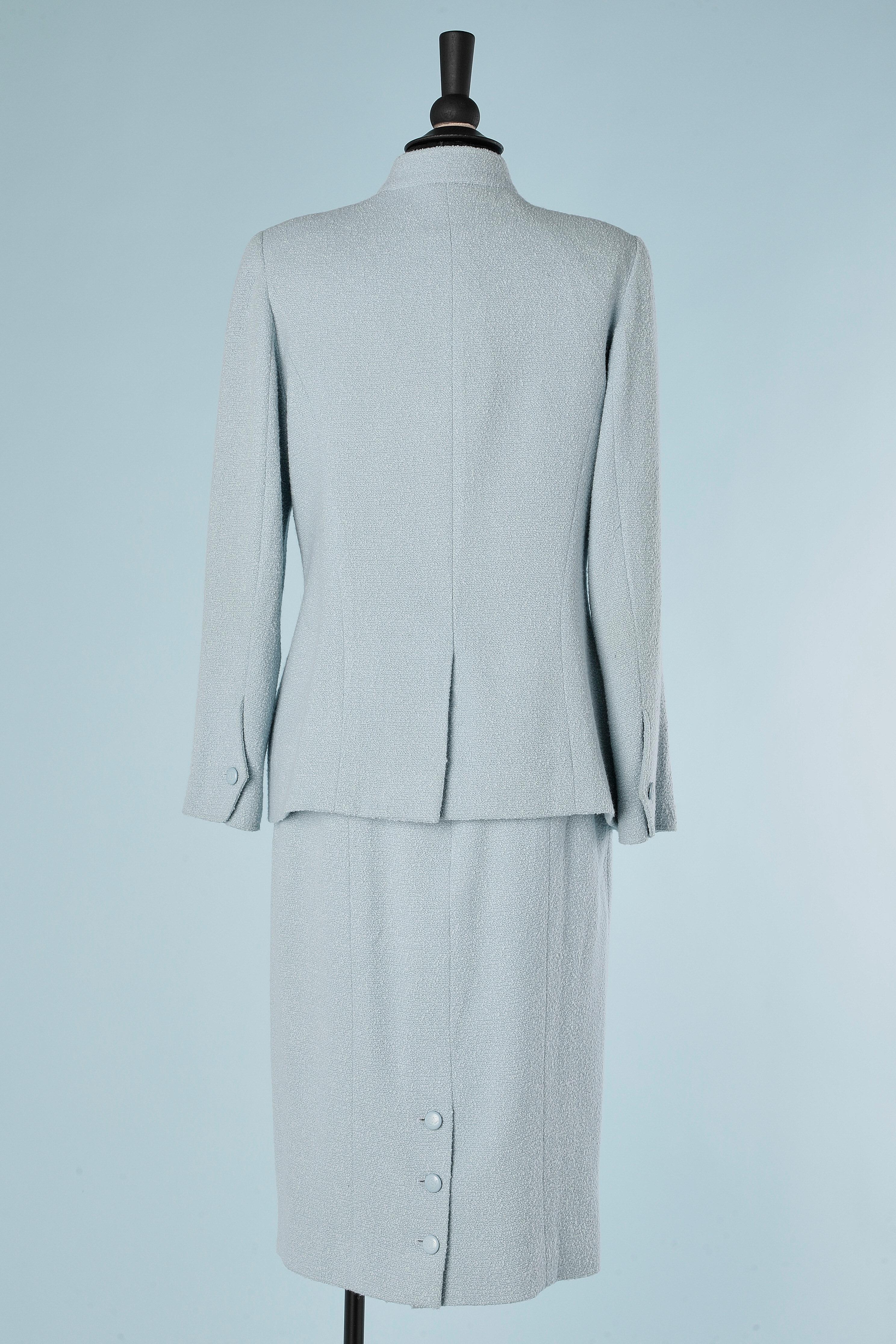Pale blue wool bouclette skirt suit  with branded buttons Chanel Boutique  In Excellent Condition For Sale In Saint-Ouen-Sur-Seine, FR