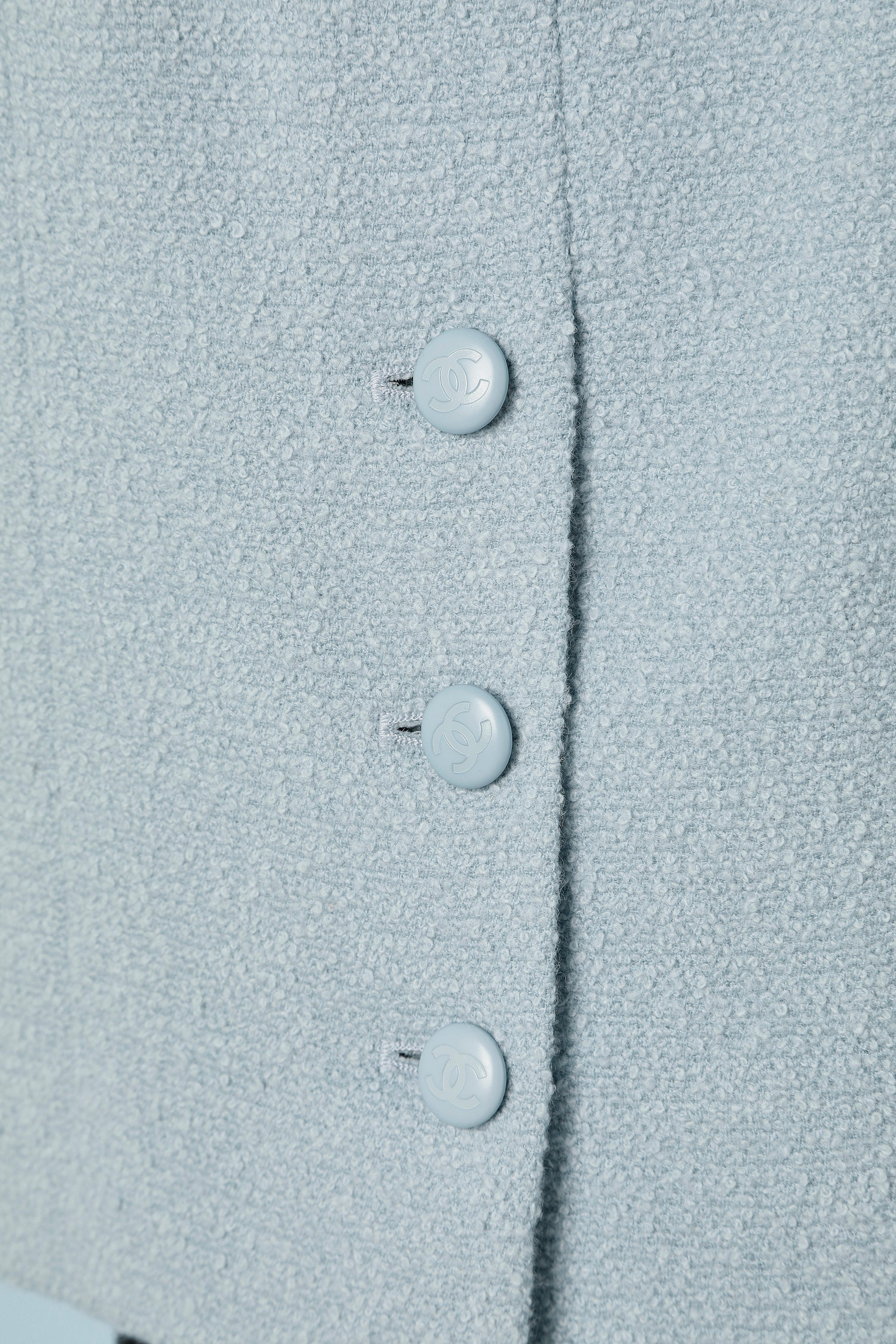 Women's Pale blue wool bouclette skirt suit  with branded buttons Chanel Boutique  For Sale