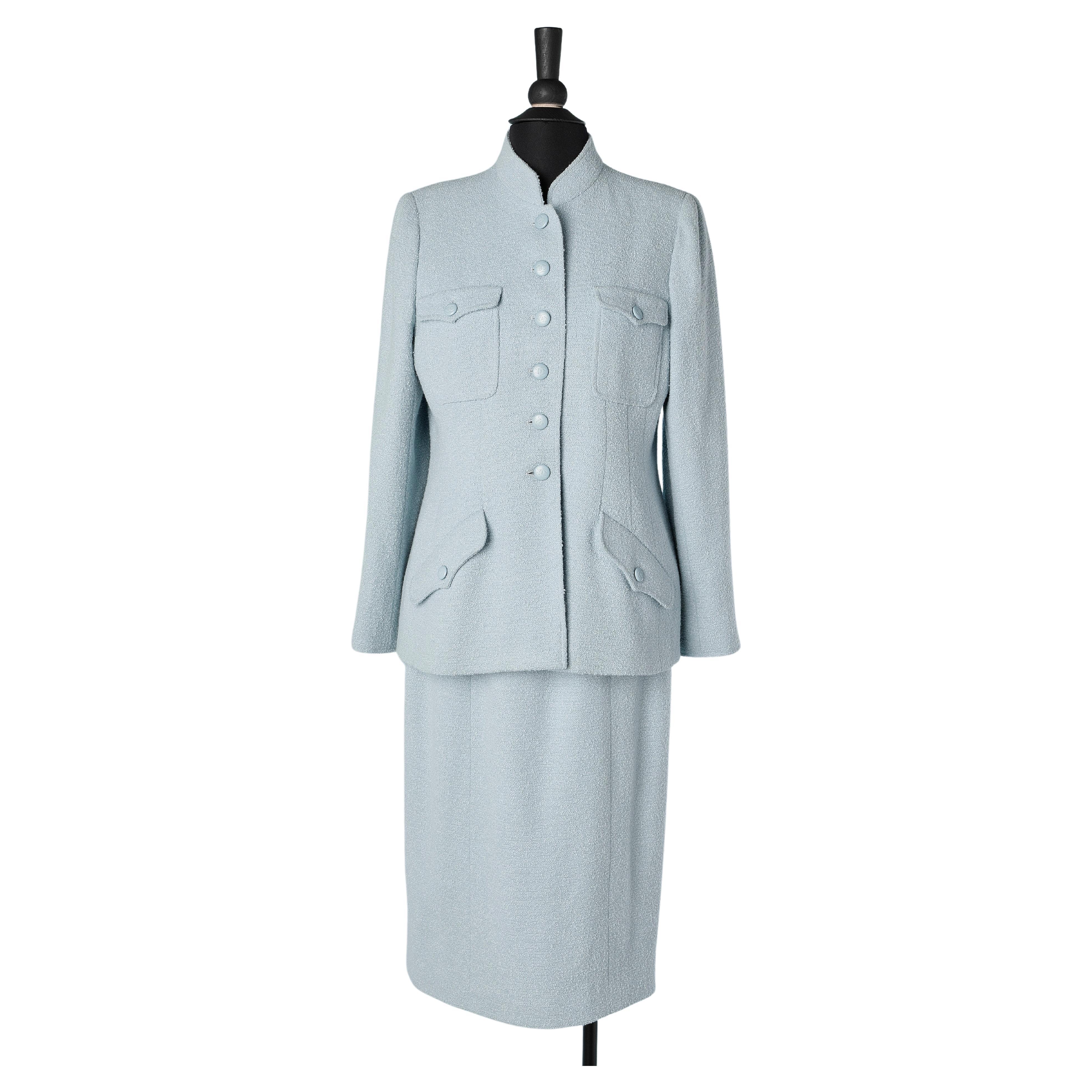 Pale blue wool bouclette skirt suit  with branded buttons Chanel Boutique  For Sale