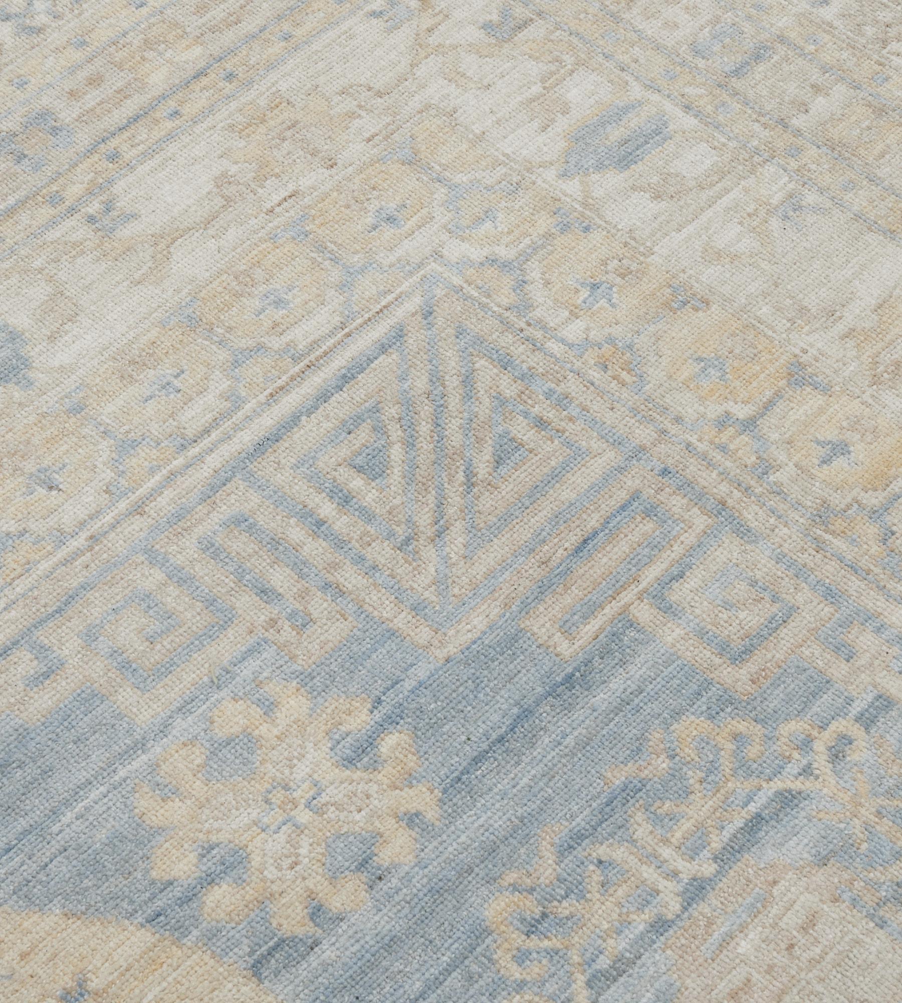 Contemporary Pale-Blue Wool Handwoven Revival Khotan Rug For Sale