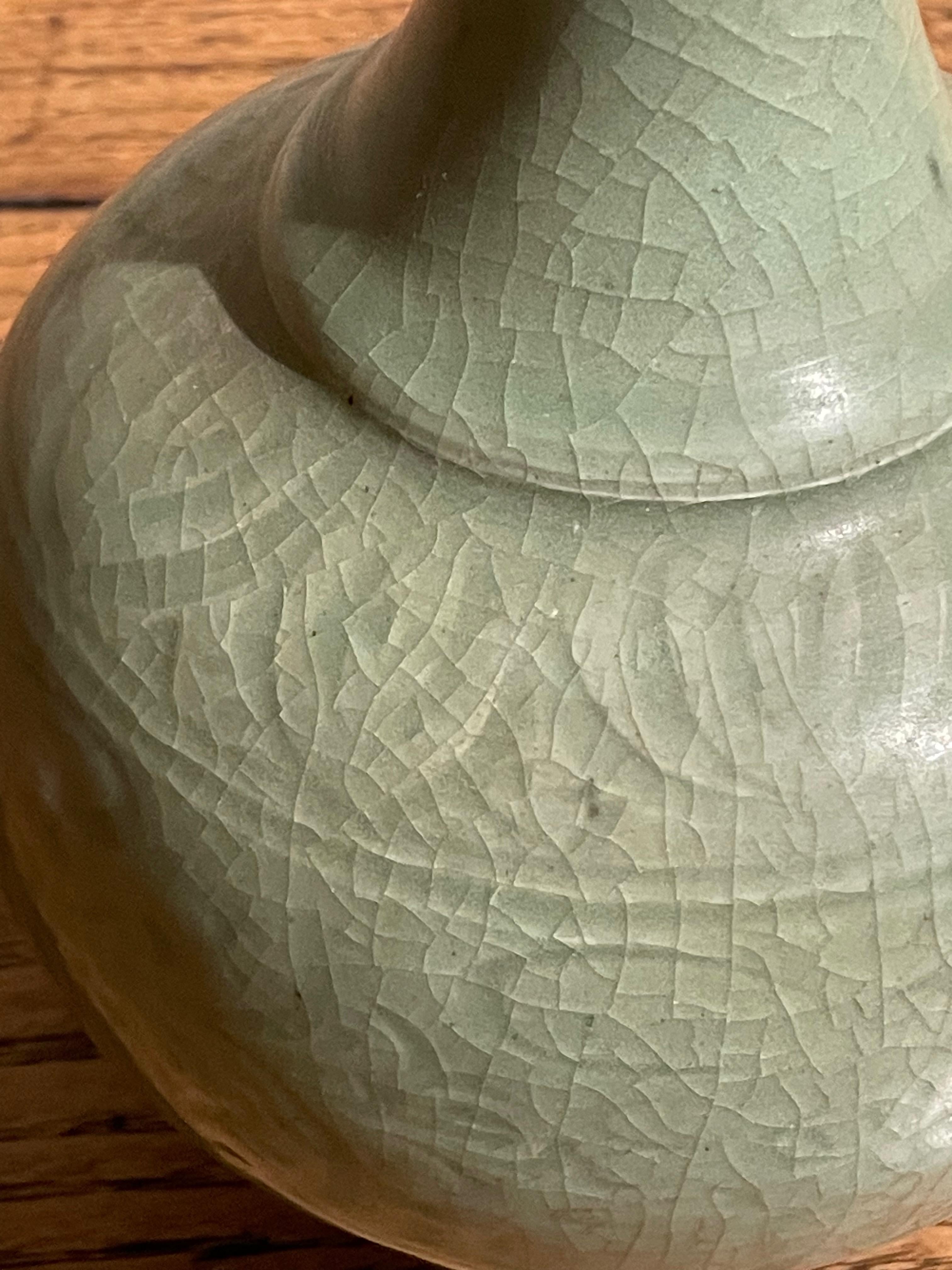 Ceramic Pale Celedon Decorative Patterned Rounded Base Vase, China, Contemporary For Sale