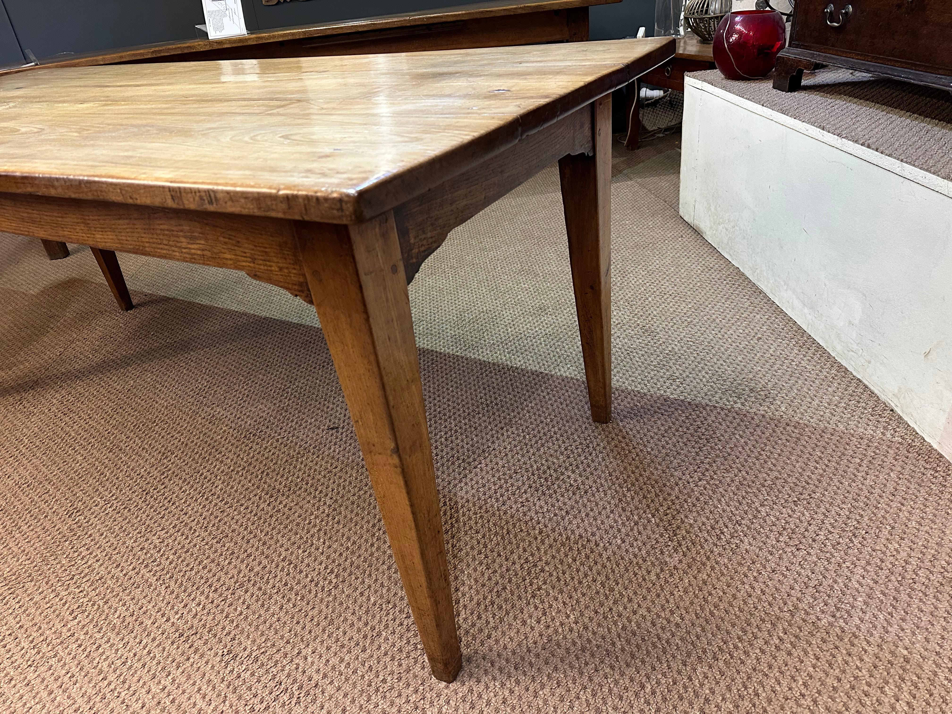 19th Century Cherry Dining Table with breadside.   Sits on four tapered cherry legs. Gorgeous colour and patination. 