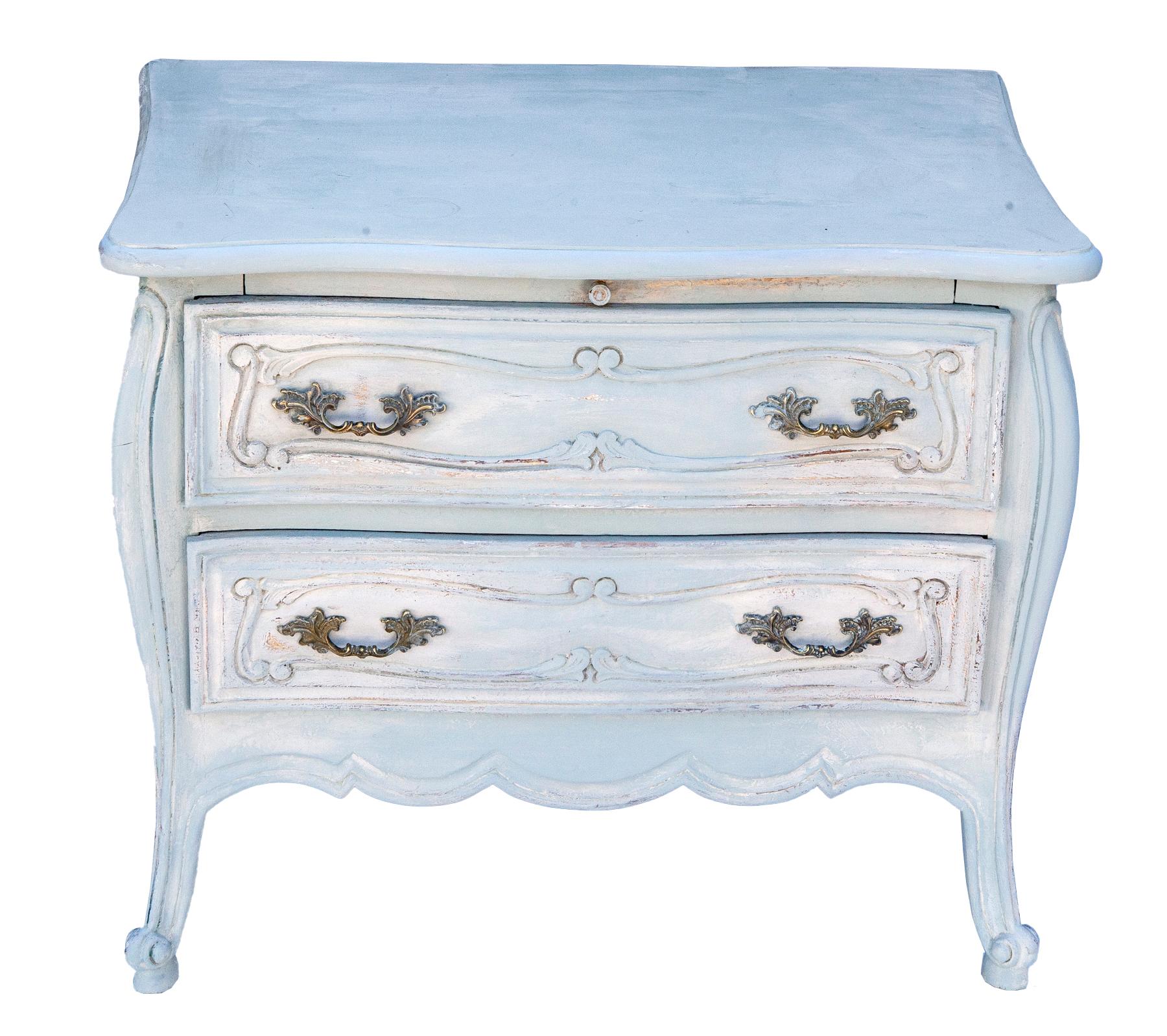 Pale blue French provincial commode/ nightstand with built-in tray & two spacious drawers. Well made piece with dovetail construction. The finish has been hand painted in multiple shades of light blues & whites. The tray has been left in a natural