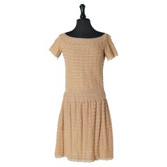 Pale gold lurex knit top and skirt ensemble with scale effect Christian Dior