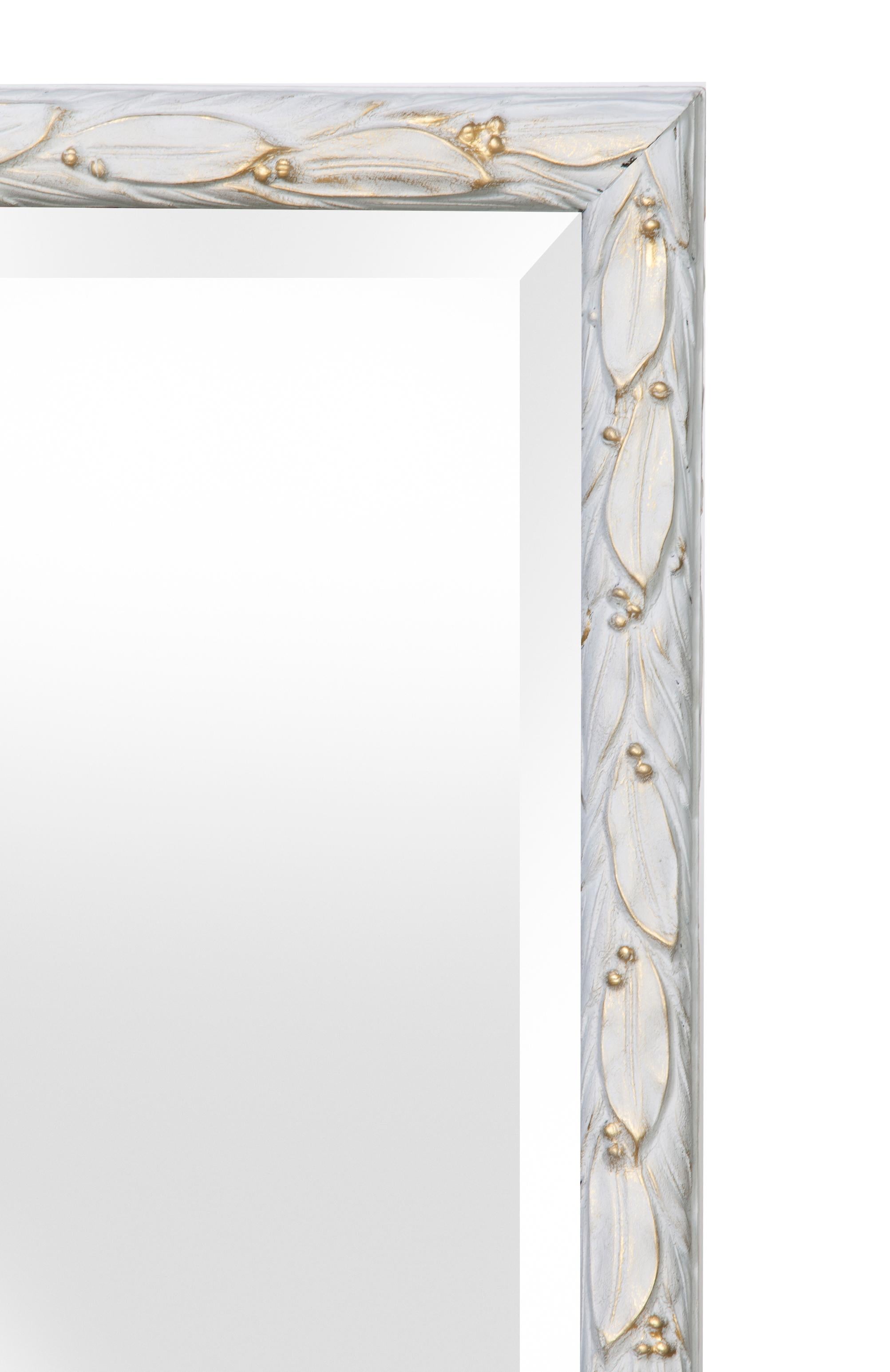 Italian hand painted mirror, incorporating both gold and clear pale gray, this mirror is simple & elegant. The gold trims the leaf edges.
Italian carved painted mirror with beautiful carved details throughout.
Wired to hang both horizontally &
