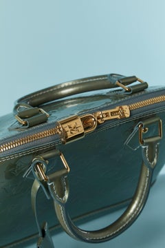Pale green leather top handle bag with Monogram Louis Vuitton
