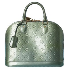 Pale green leather top handle bag with Monogram Louis Vuitton