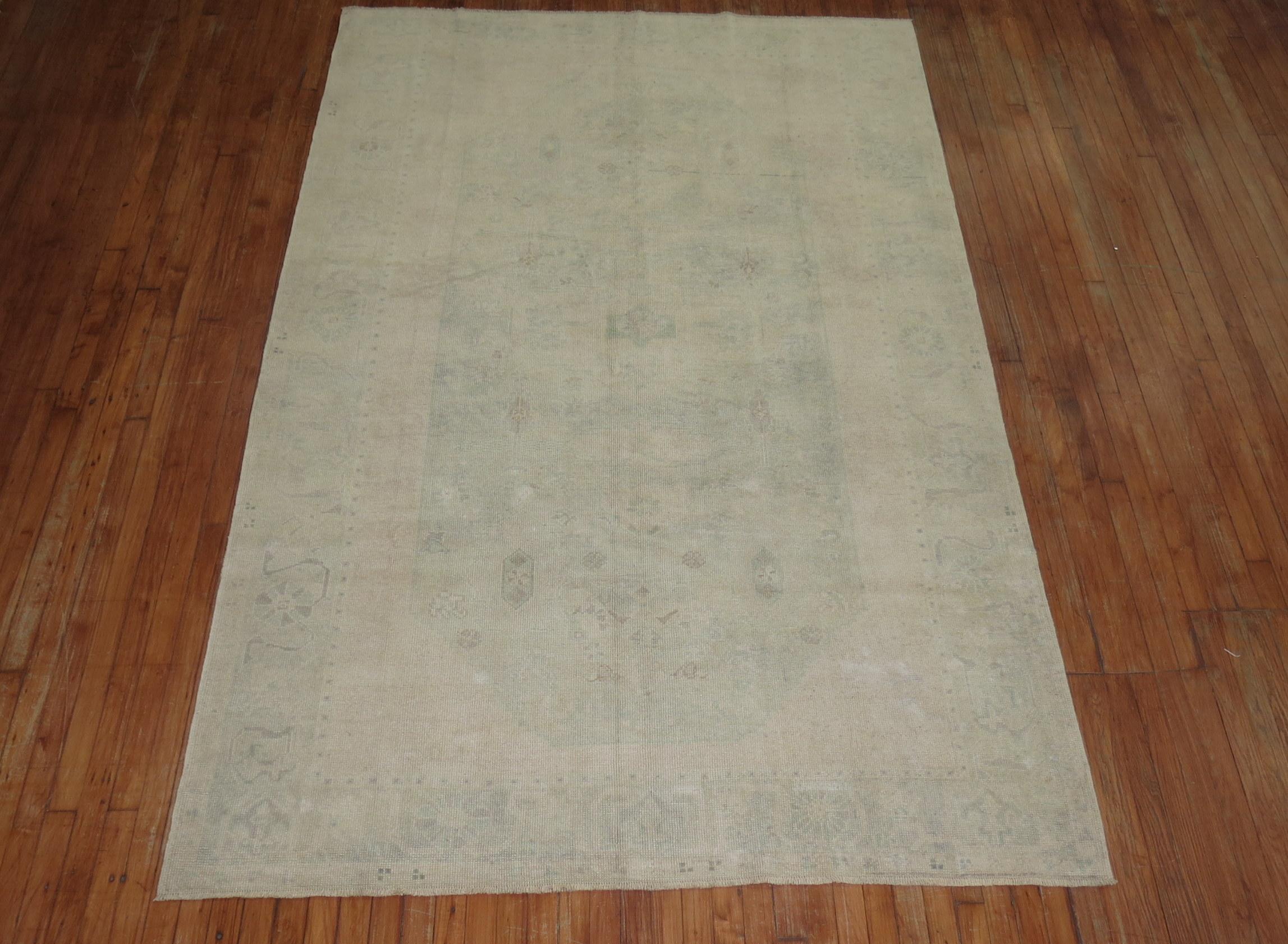 MId 20th century Pale green and cream Turkish Oushak rug

Measures: 6' x 9'4''.