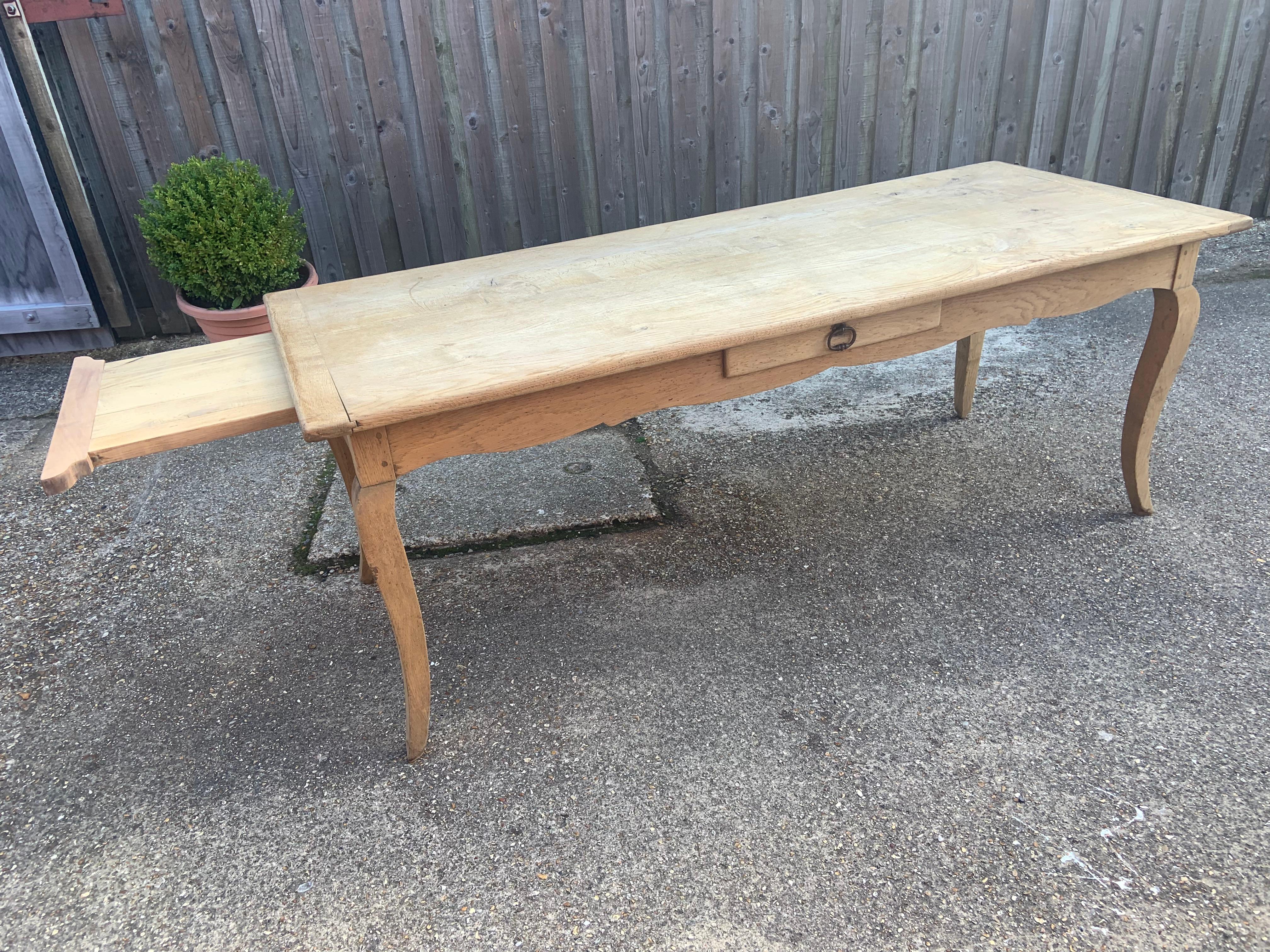 Pale Oak Cabriole leg Farmhouse table with one side drawer and bread slide. This table has beautiful cabriole legs. The table has been bleached to give it a very pale colour in oak. Very sturdy and well constructed.

 
