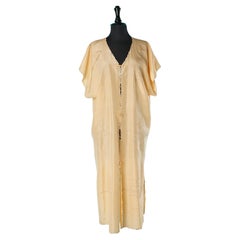 Pale orange Robe with thread embroideries Circa 1920
s