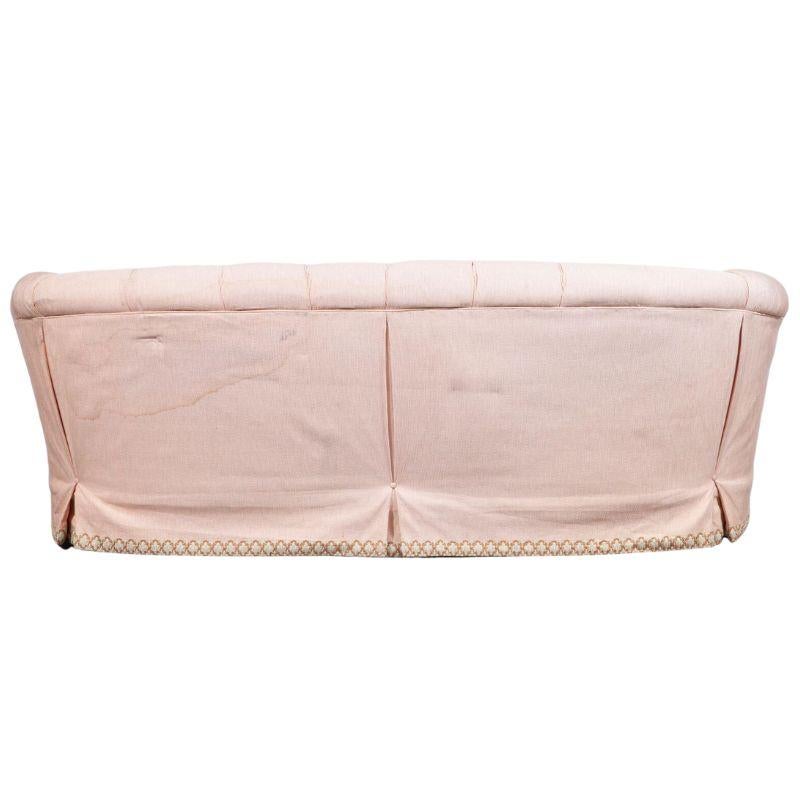 tufted pink sofa