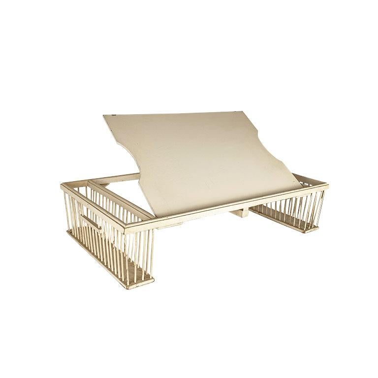 Pale ballet pink bamboo and wood breakfast or bed tray. A fantastic piece with a removable wicker tray with wicker handles. The tray has glass on top to shield the wood and make cleaning easy. Braided wicker outlines the exterior around the