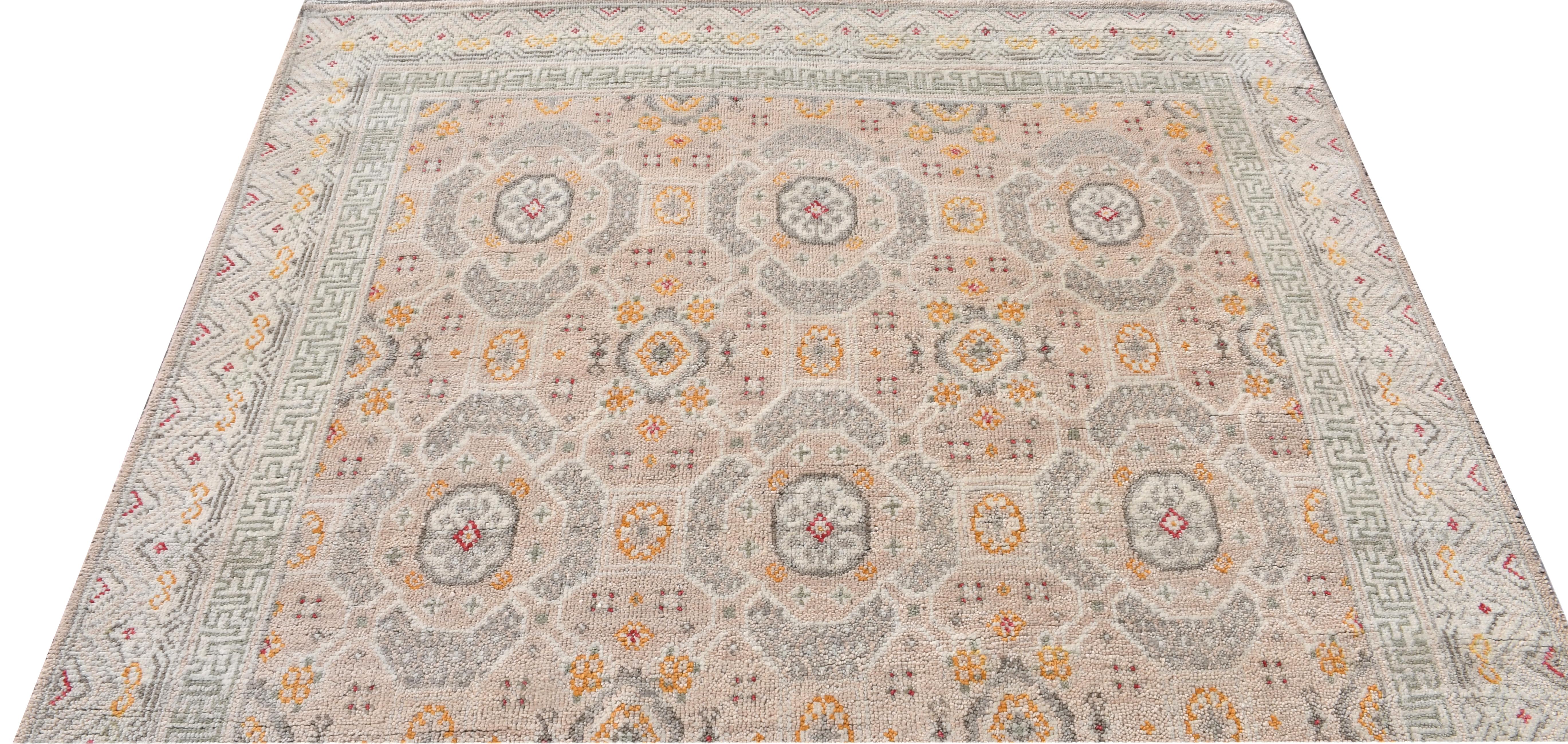 Hand-knotted wool pile on a cotton foundation.

Dimensions: 6' x 9'

New

Origin: India

Field Color: Pale-Pink

Border Color: Ivory

Accent Colors: Turmeric, Red, Brown