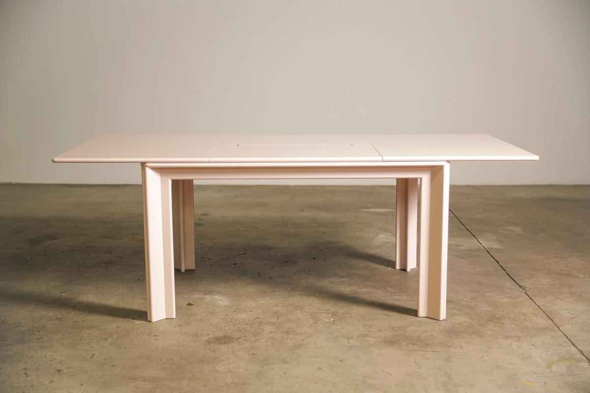 Solid timber dining table designed by Afra & Tobia Scarpa for Molteni, 1974. This version is extendable and has been newly restored and lacquered in pale pink.
Dimensions: Closed L 132, Open 205, H 73, D 95cm