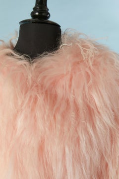 Pale pink Mongolian's fur edge to edge jacket