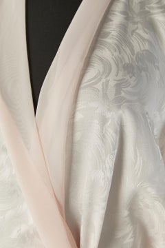 Pale pink négligé with lace inset and tiny roses on the sleeves Christian Dior