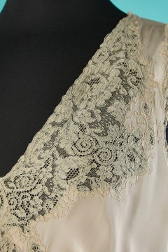 Pale pink rayon nightgown with lace inset Circa 1930's