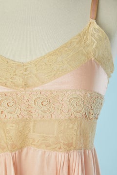 Pale pink short silk slip dress with lace inset and tulle edge Circa 1920's