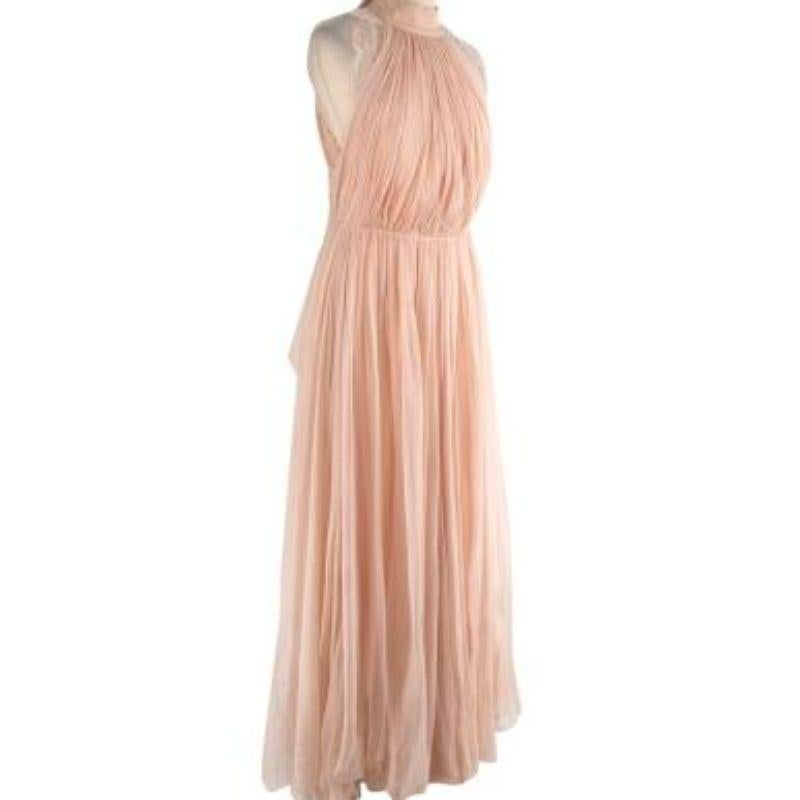 Maria Lucia Hohan Pale pink sill chiffon lace trimmed gown
 
 - High, button-fastened neckline with draped bodice and lace along each armhole
 - Cinched waistline
 - Maxi length draped skirt with zip fastening at the back 
 - Open back with an