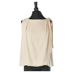 Pale pink sleeveless top with  white dots jacquard and bow on the side Chloé 