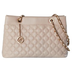 Pale pink top-stitched and quilted leather bag with top handle in chain CHOPARD