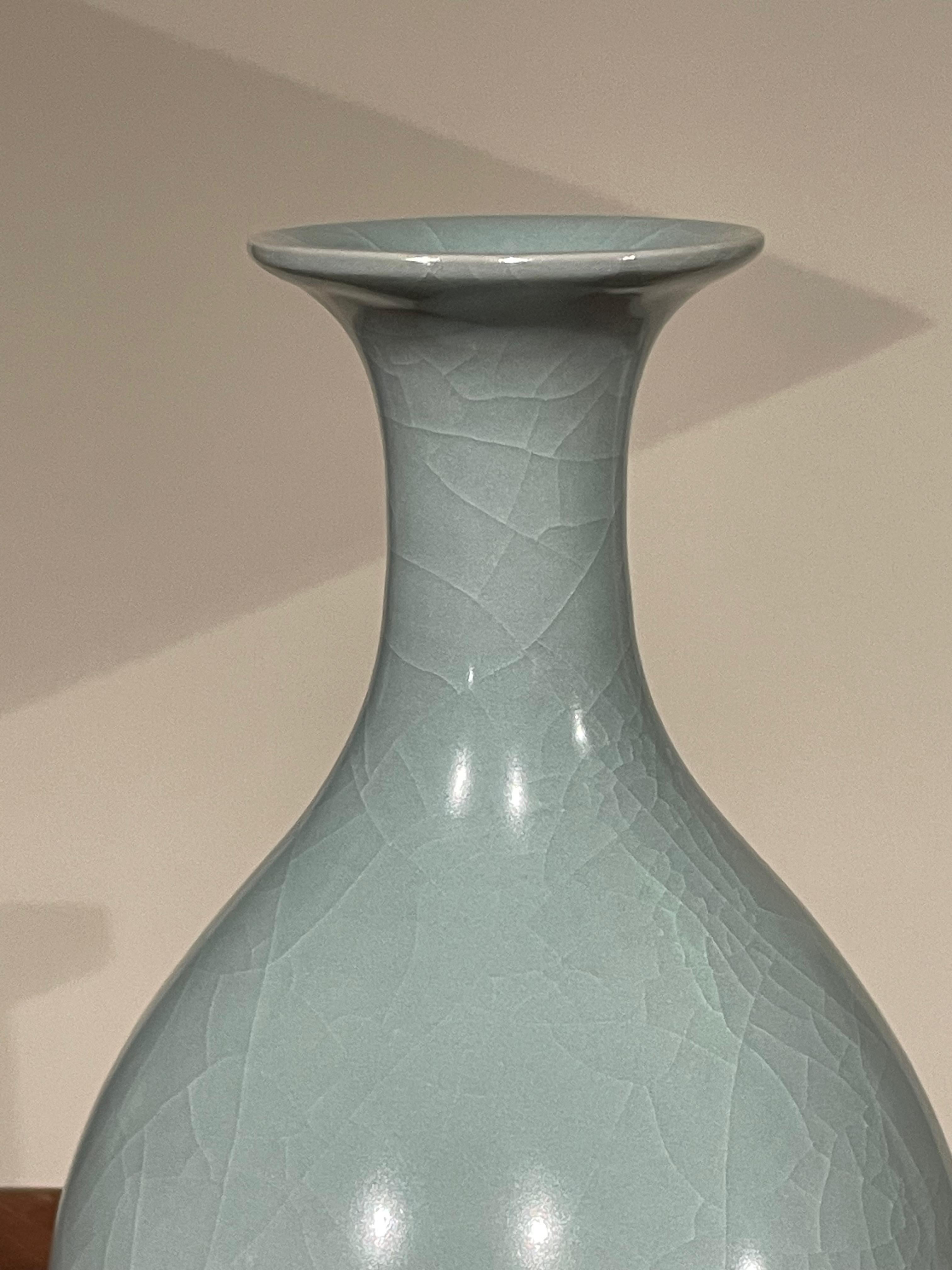Contemporary Chinese pale turquoise vase.
Classic shape with rounded bottom.
Large collection available with varying sizes and shapes.
Sold individually.
ARRIVING APRIL