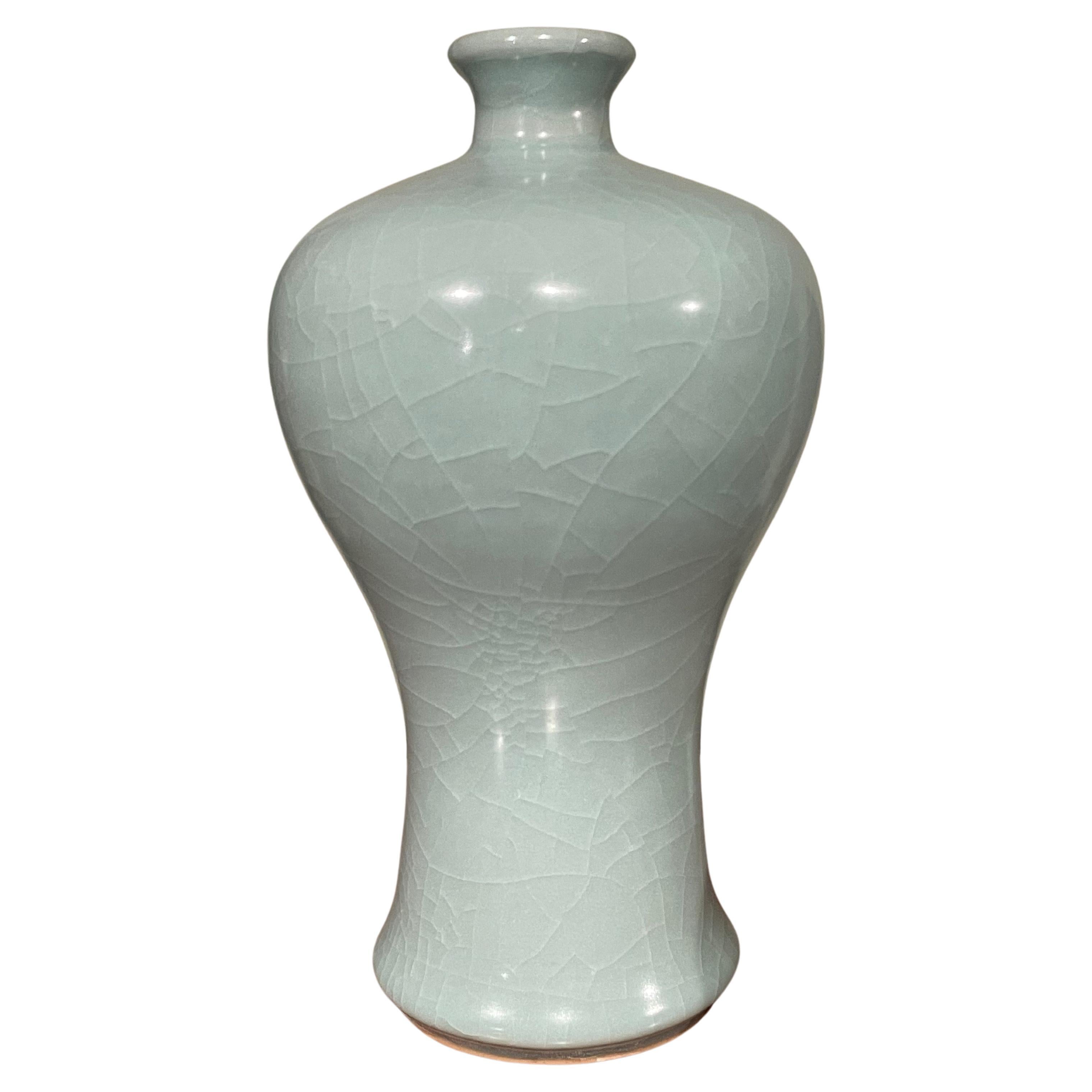 Pale Turquoise Curve Shape With Small Spout Vase, China, Contemporary For Sale