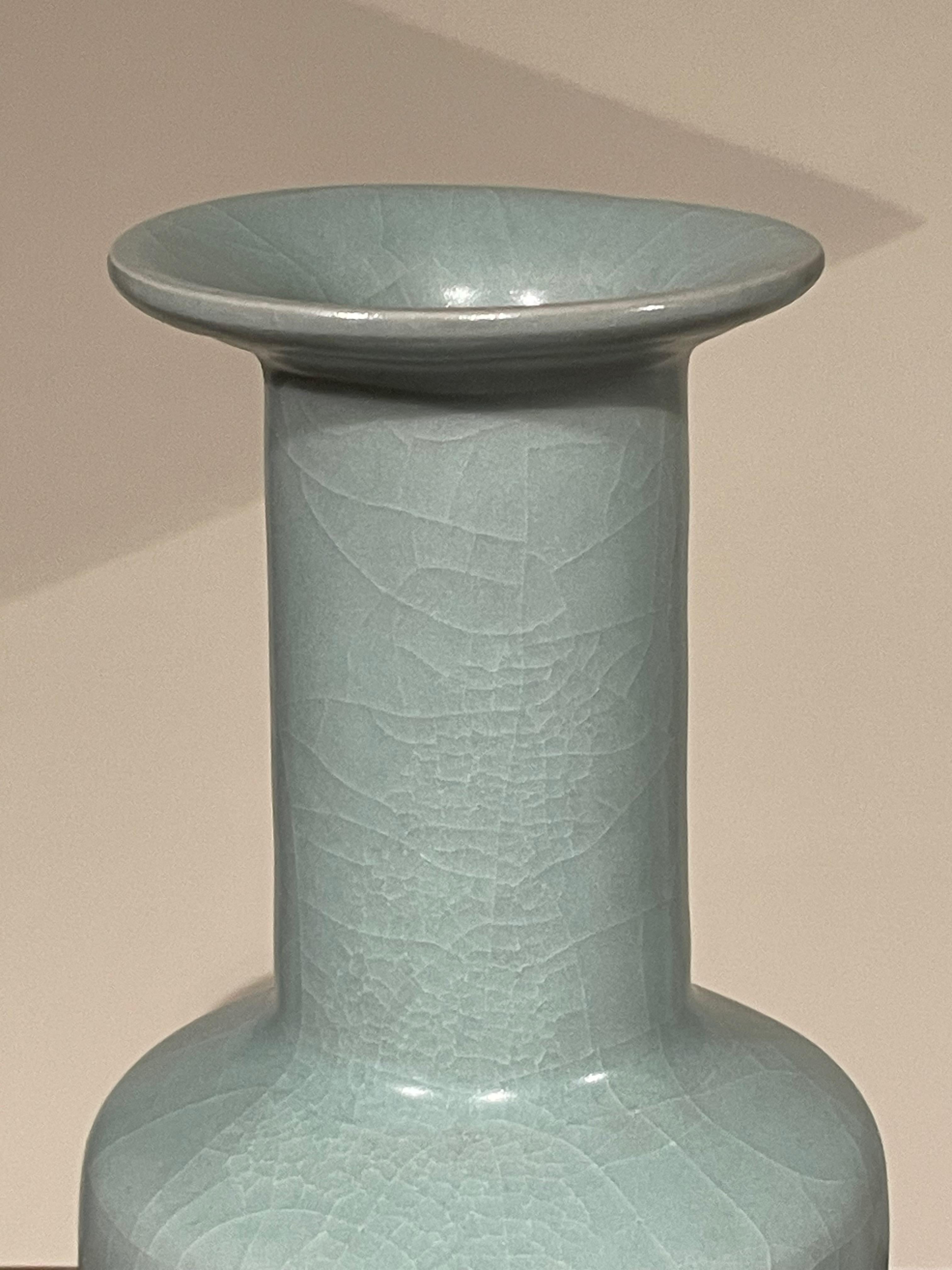 Contemporary Chinese pale turquoise vase.
Cylinder shaped bottom.
Large collection available with varying sizes and shapes.
