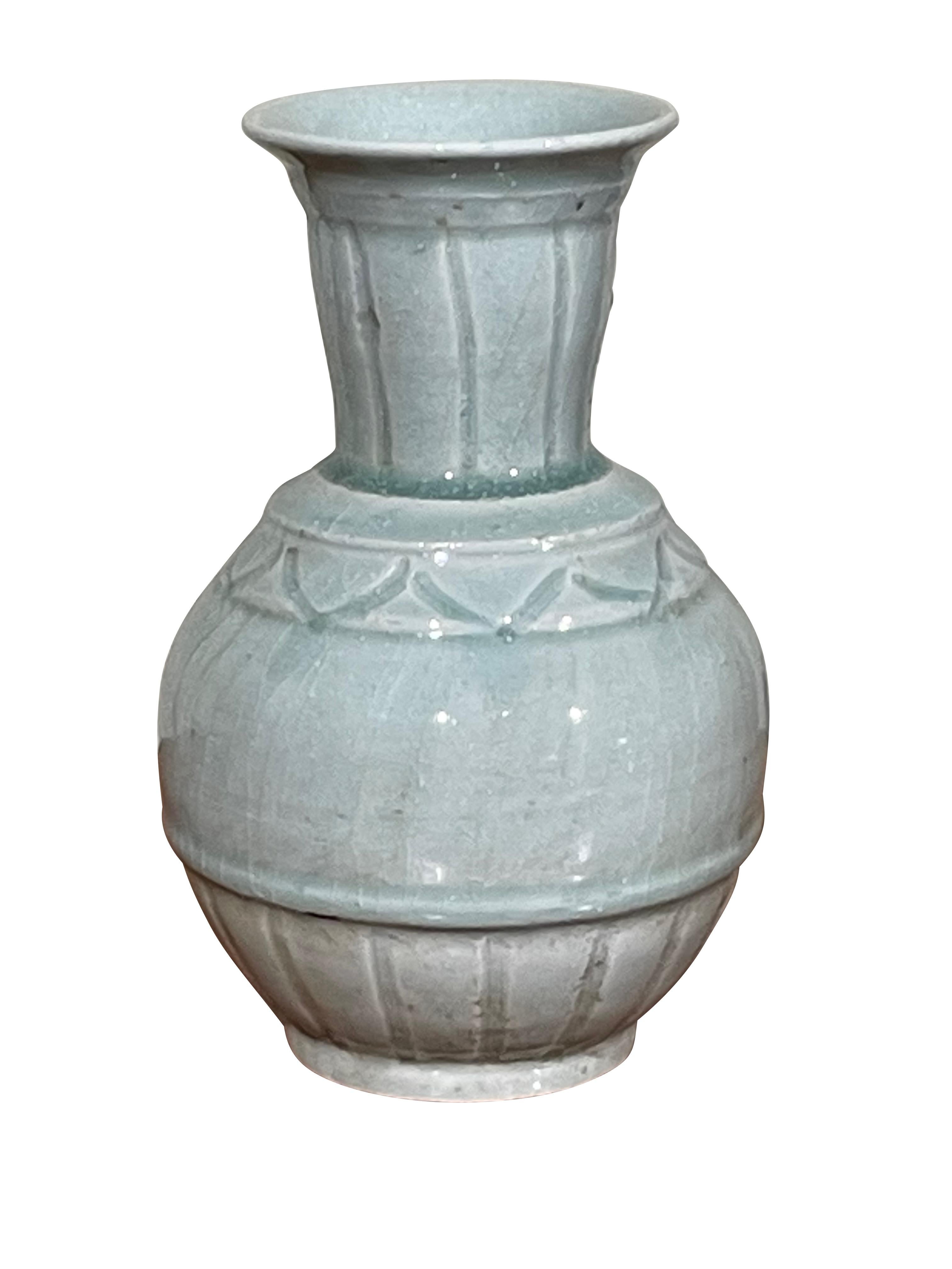 Contemporary Chinese pale turquoise vase.
Decorative design.
From a collection of three pieces sold individually.
