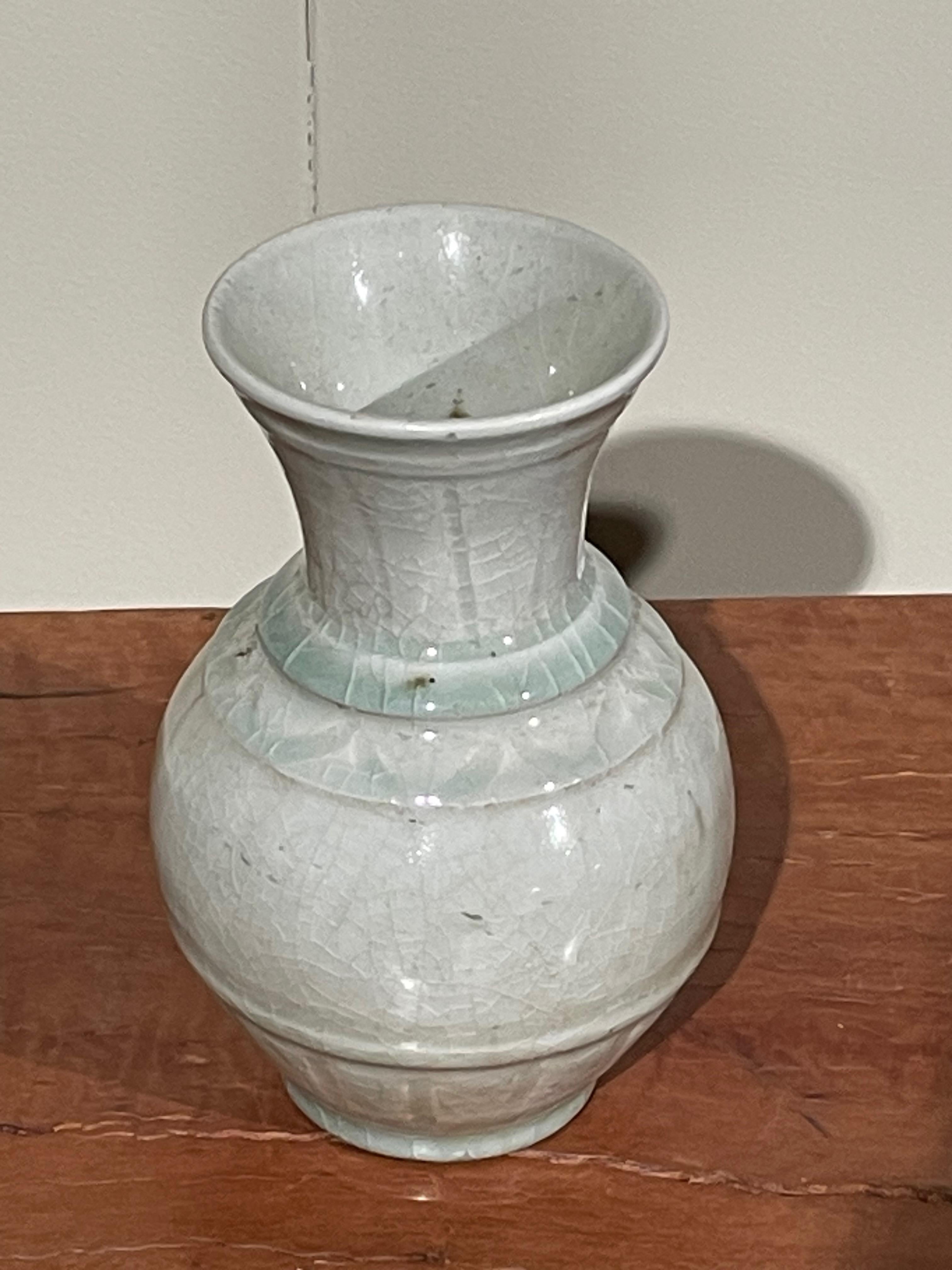 Contemporary Chinese pale turquoise vase.
V design.
