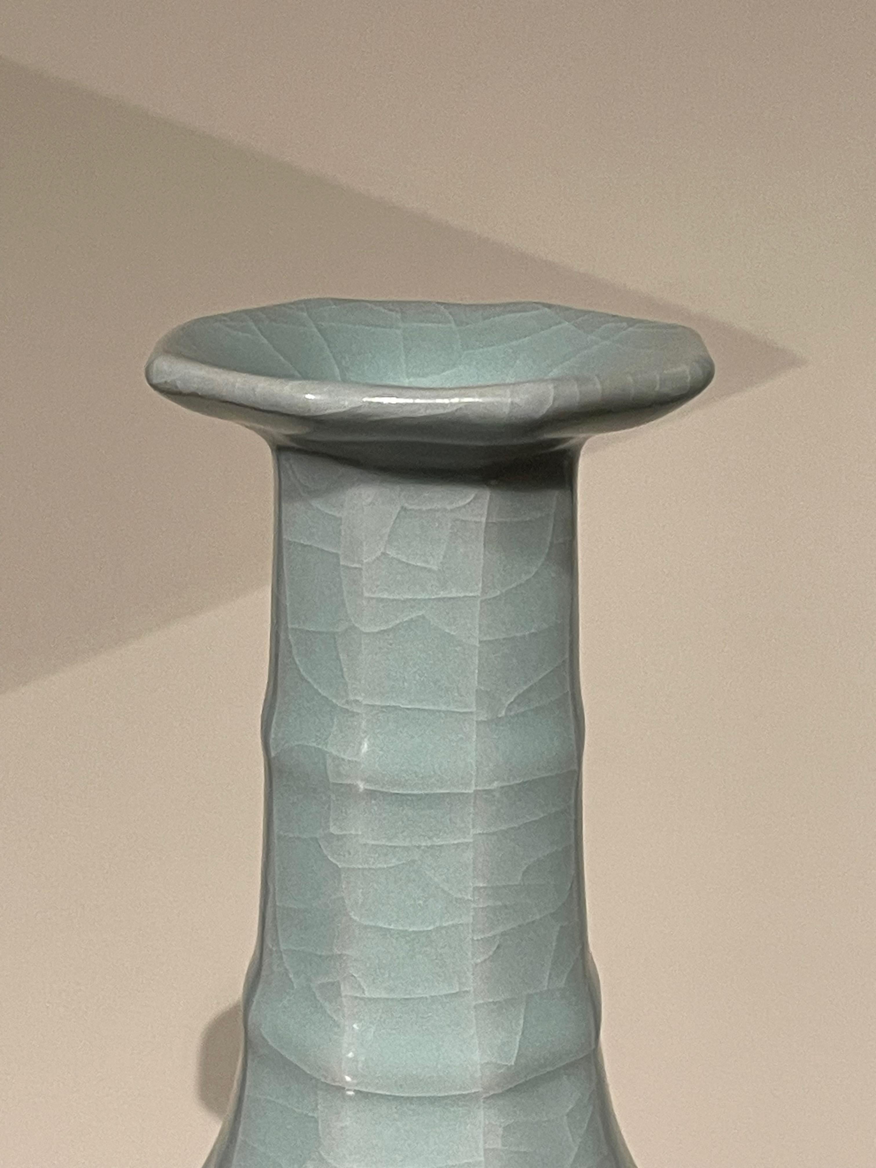 Contemporary Chinese pale turquoise vase.
Octagonal shape with ribbed details on elongated neck.
Large collection available with varying sizes and shapes.
ARRIVING MARCH